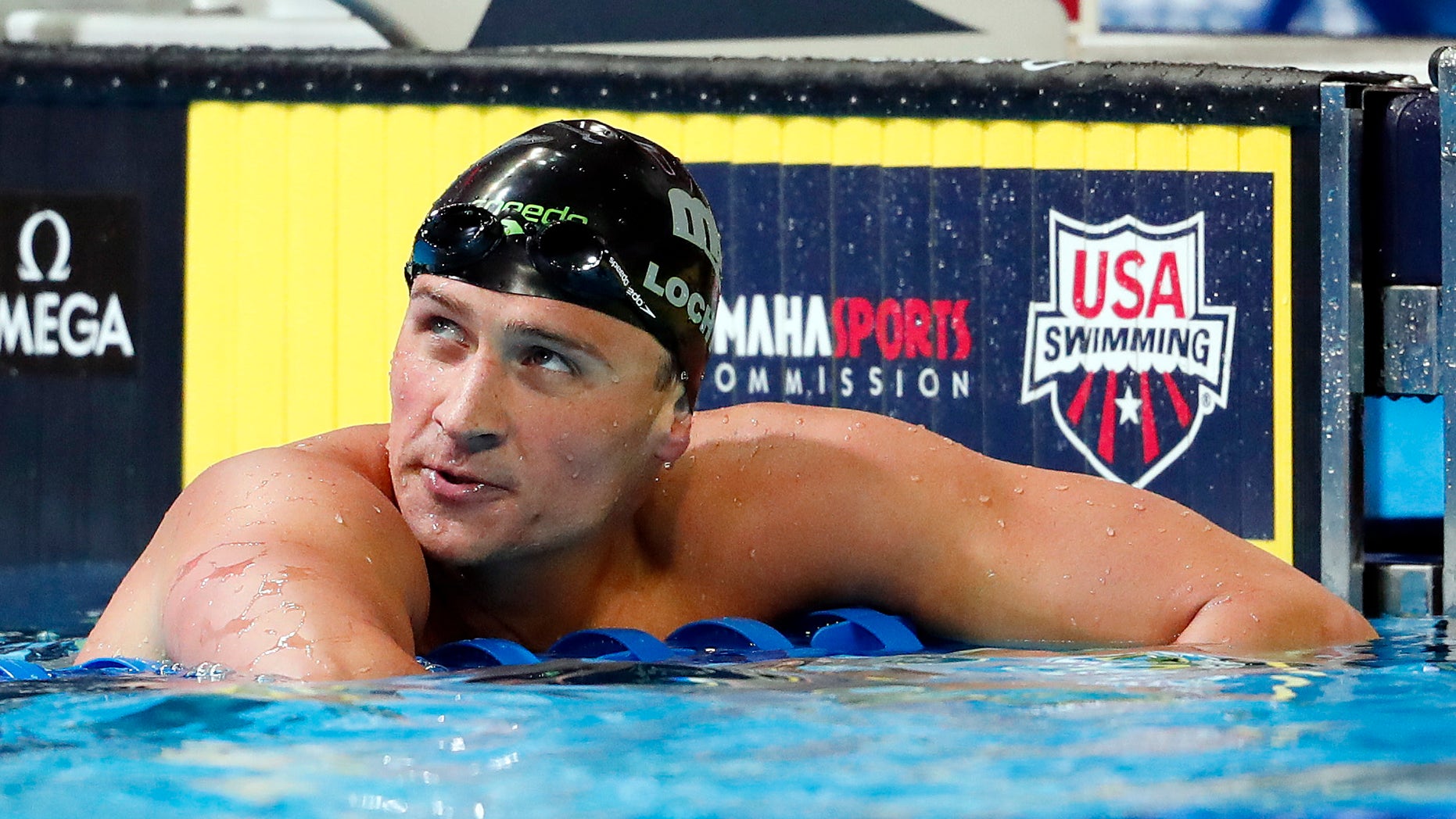 Jun 28, 2016; Omaha, NE, USA; Ryan Lochte reacts after the men's freestyle 200m finals in the U.S. Olympic swimming team trials at CenturyLink Center. Mandatory Credit: Rob Schumacher-USA TODAY Sports - RTX2IRZN