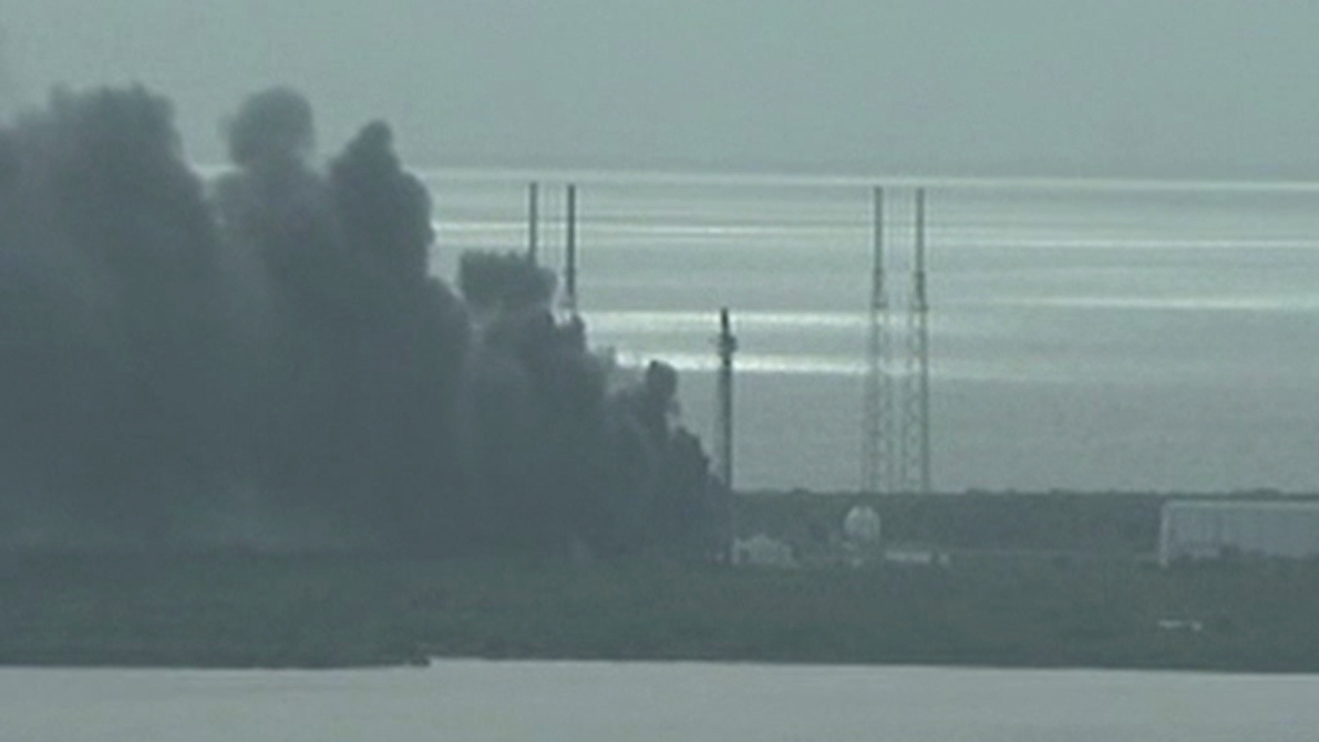 A still image taken from video of smoke rising on the launch site of SpaceX Falcon 9 rocket in Cape Canaveral, Florida, September 1, 2016. (NASA TV/Handout via REUTERS)