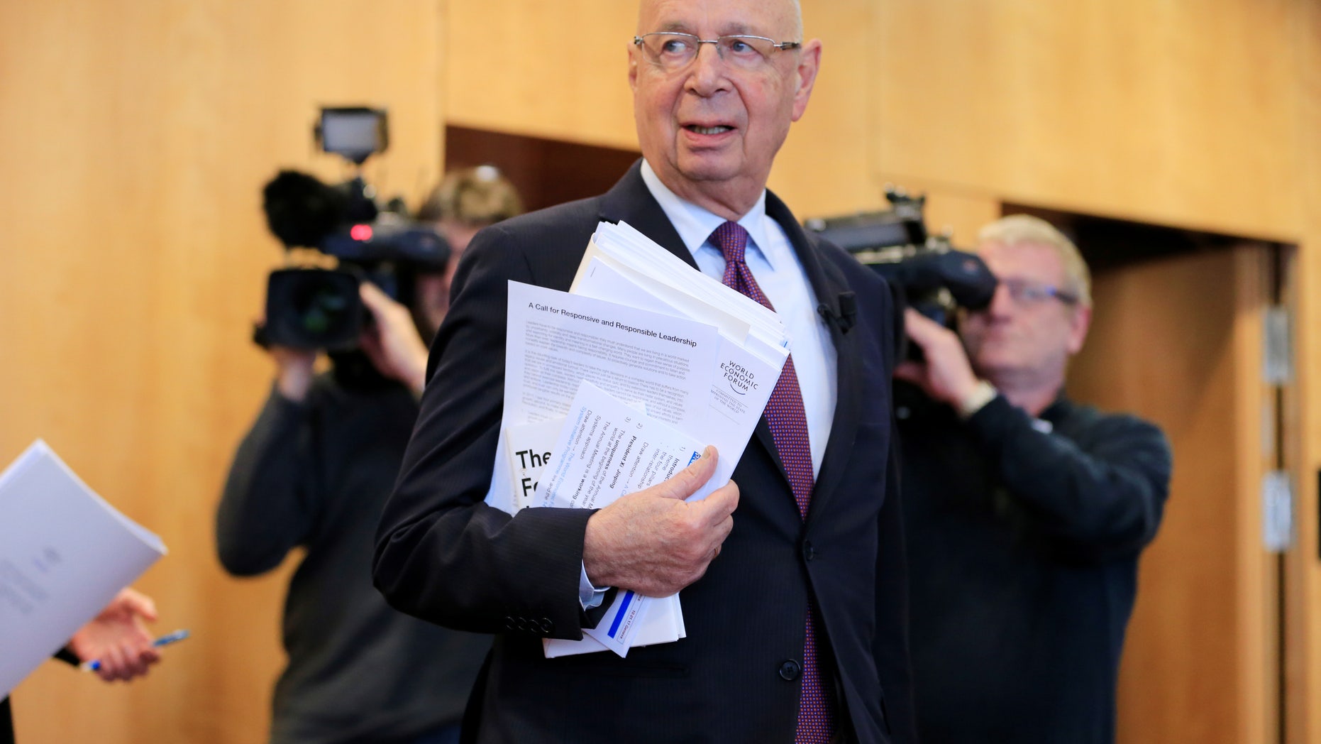World Economic Forum (WEF) Executive Chairman and founder Klaus Schwab arrives at a news conference in Cologny, near Geneva, Switzerland January 10, 2017.