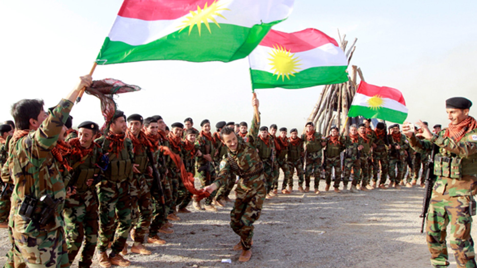 March 20, 2017: Kurdish Peshmerga forces celebrate Newroz Day, a festival marking spring and the new year, in Kirkuk.