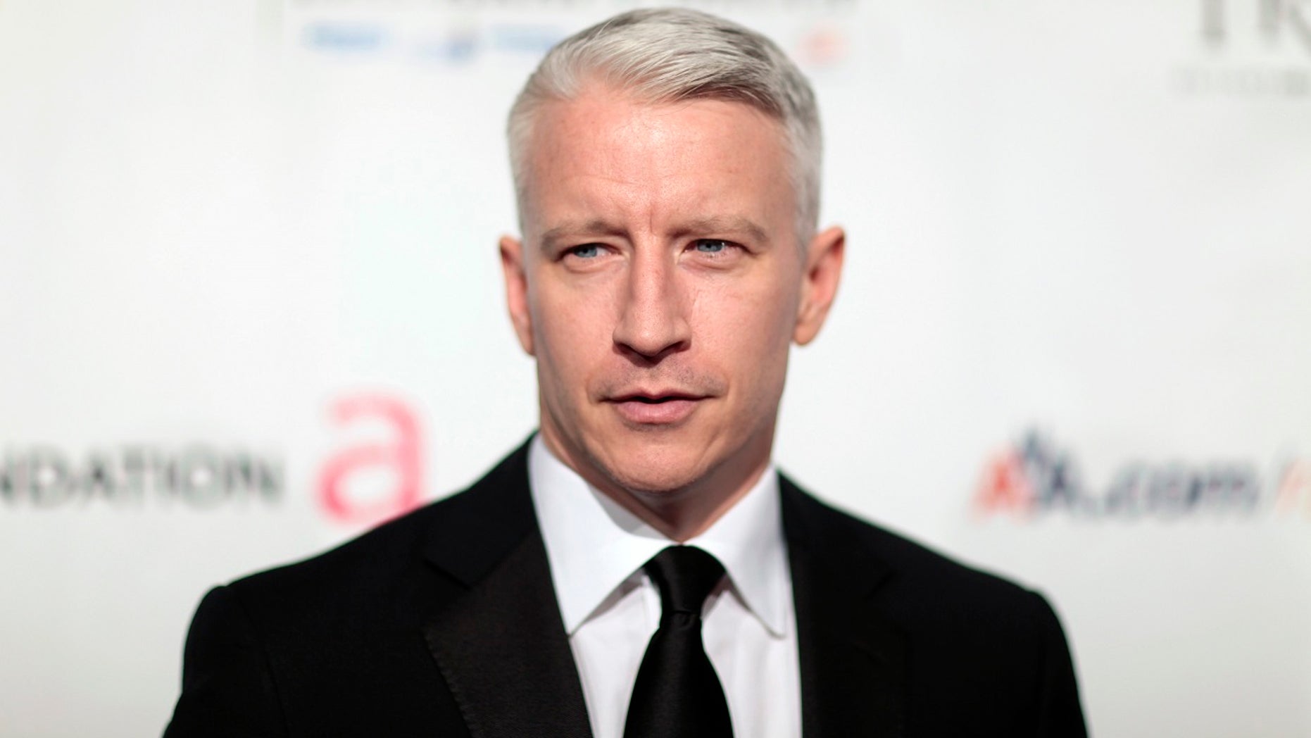 Anderson Cooper arrives at a benefit dinner for the Elton John Aids Foundation in New York, Nov. 16, 2009.