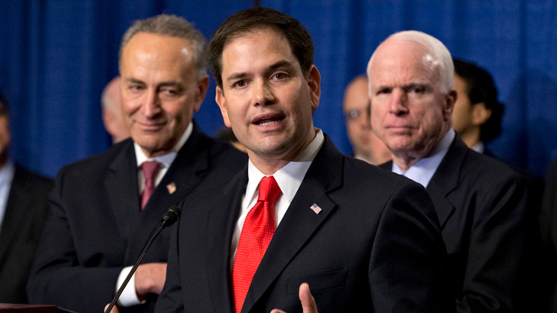 April 18, 2013: Sen. Marco Rubio, R-Fla., flanked by Sen. Charles Schumer, D-N.Y., left, and Sen. John McCain, R-Ariz., right, speaks about immigration legislation.