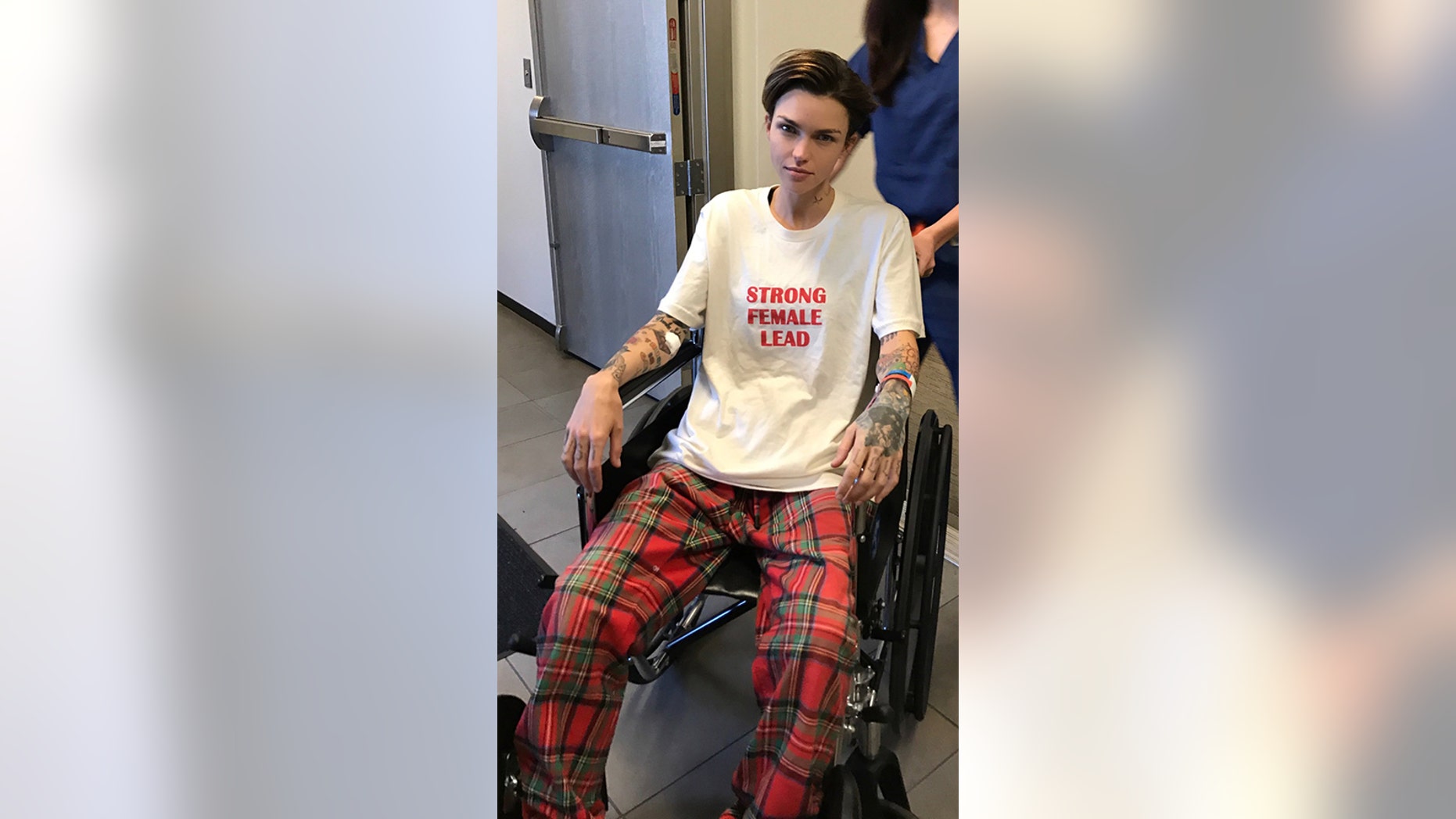 Actress and model Ruby Rose gets used to her wheelchair after undergoing spine surgery.