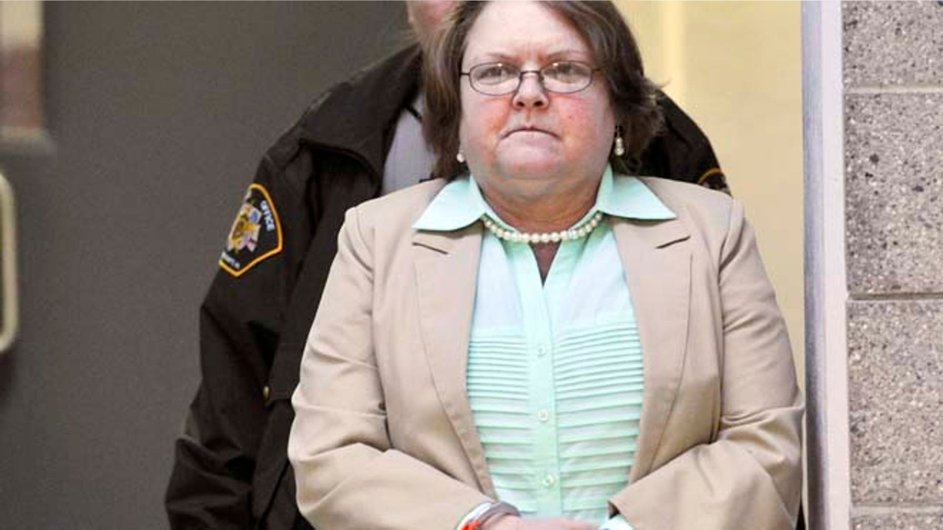 March 10, 2015: Joyce Hardin Garrard walks to the Etowah County Judicial Building from the Etowah County Detention Center in Gadsden, Ala. (AP/AL.com, Frank Couch)