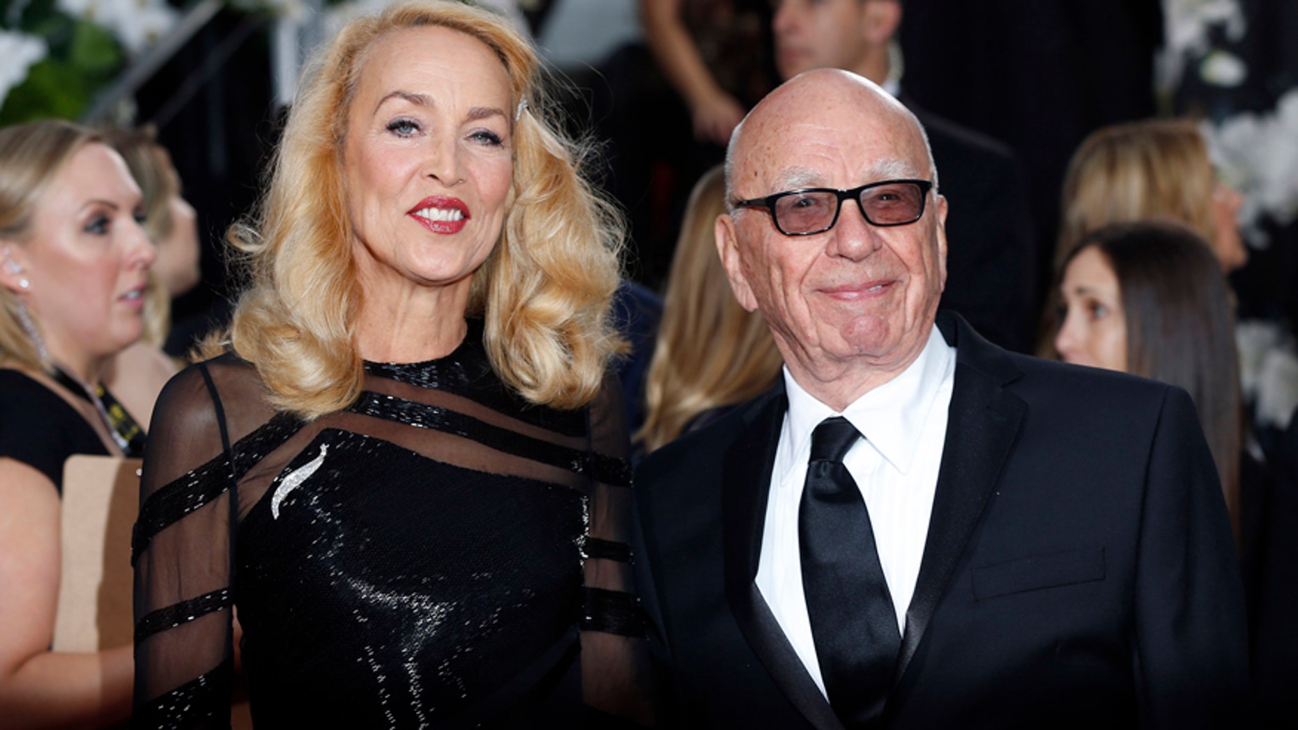 Model Jerry Hall and Rupert Murdoch arrive at the 73rd Golden Globe Awards in Beverly Hills, California January 10, 2016. REUTERS