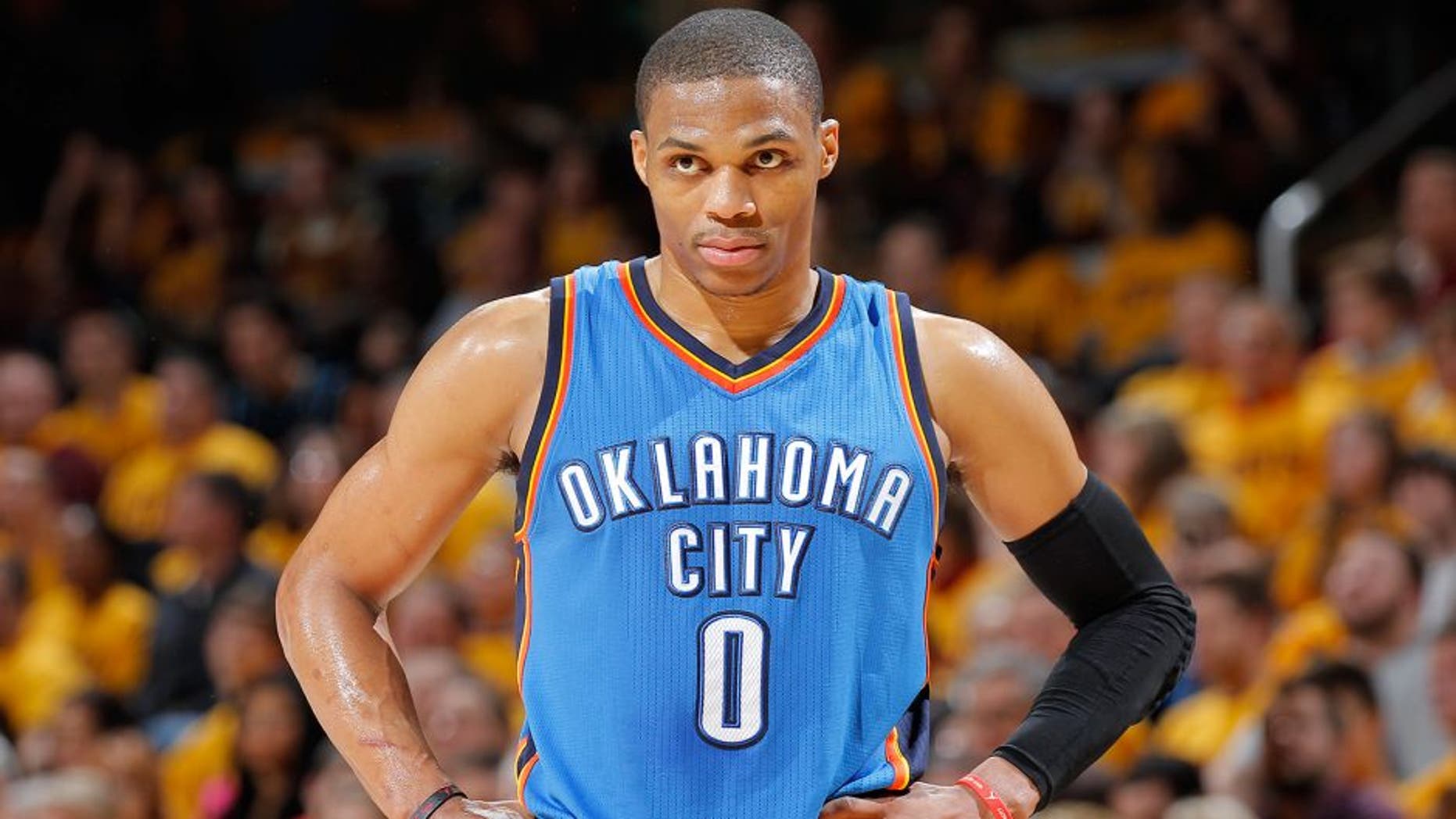 CLEVELAND, OH - JANUARY 25: Russell Westbrook #0 of the Oklahoma City Thunder looks on during the game against the Cleveland Cavaliers on January 25, 2015 at Quicken Loans Arena in Cleveland, Ohio. NOTE TO USER: User expressly acknowledges and agrees that, by downloading and or using this Photograph, user is consenting to the terms and condition of the Getty Images License Agreement. (Photo by Rocky Widner/Getty Images)