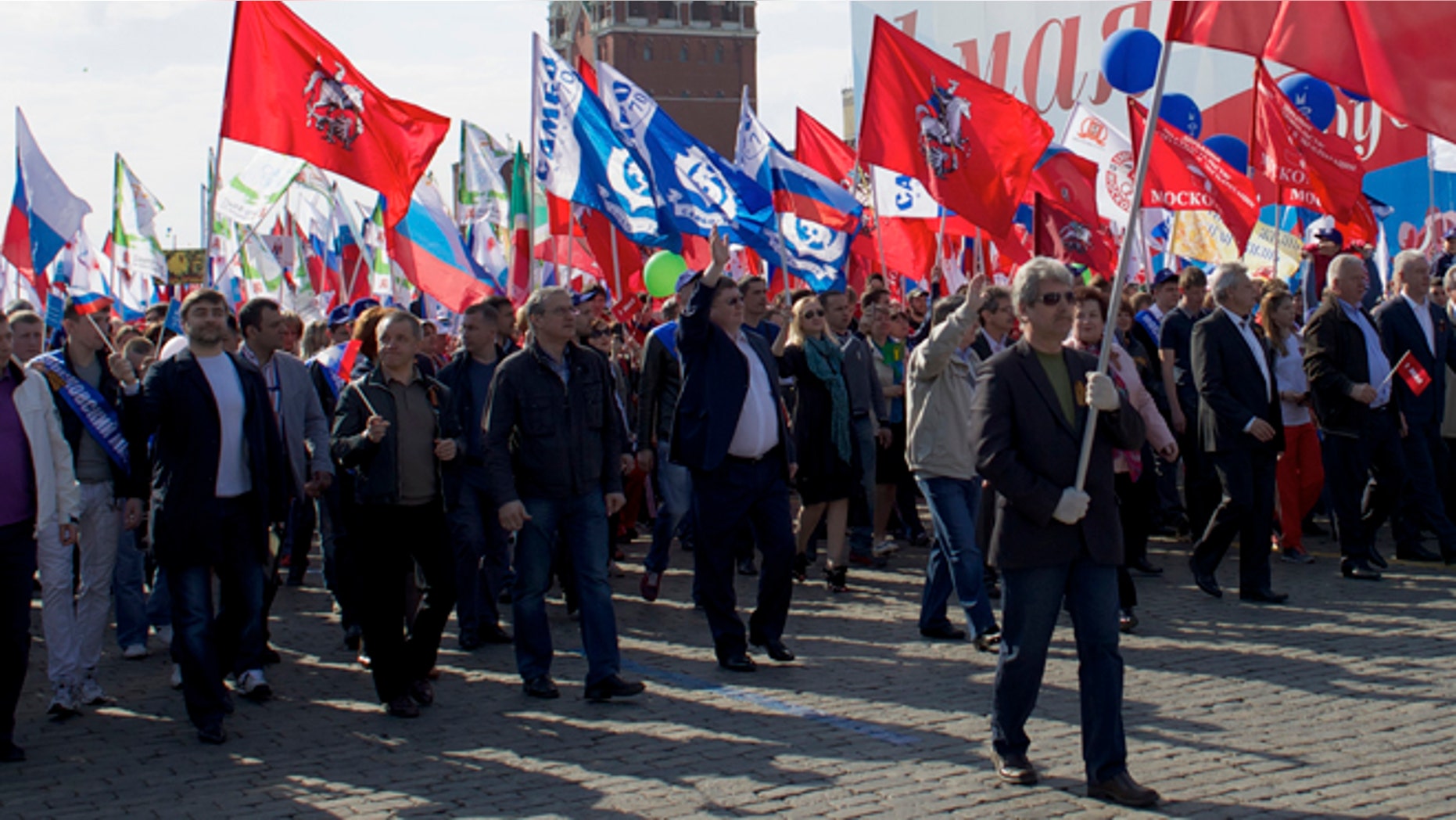 May 1, 2014: Members of Russian Trade Unions march during the May Day celebration in Red Square, Moscow, Russia. About 100,000 people have marched through Red Square to celebrate May Day, the first time the annual parade has been held on the vast cobblestoned square outside the Kremlin since the fall of the Soviet Union in 1991.