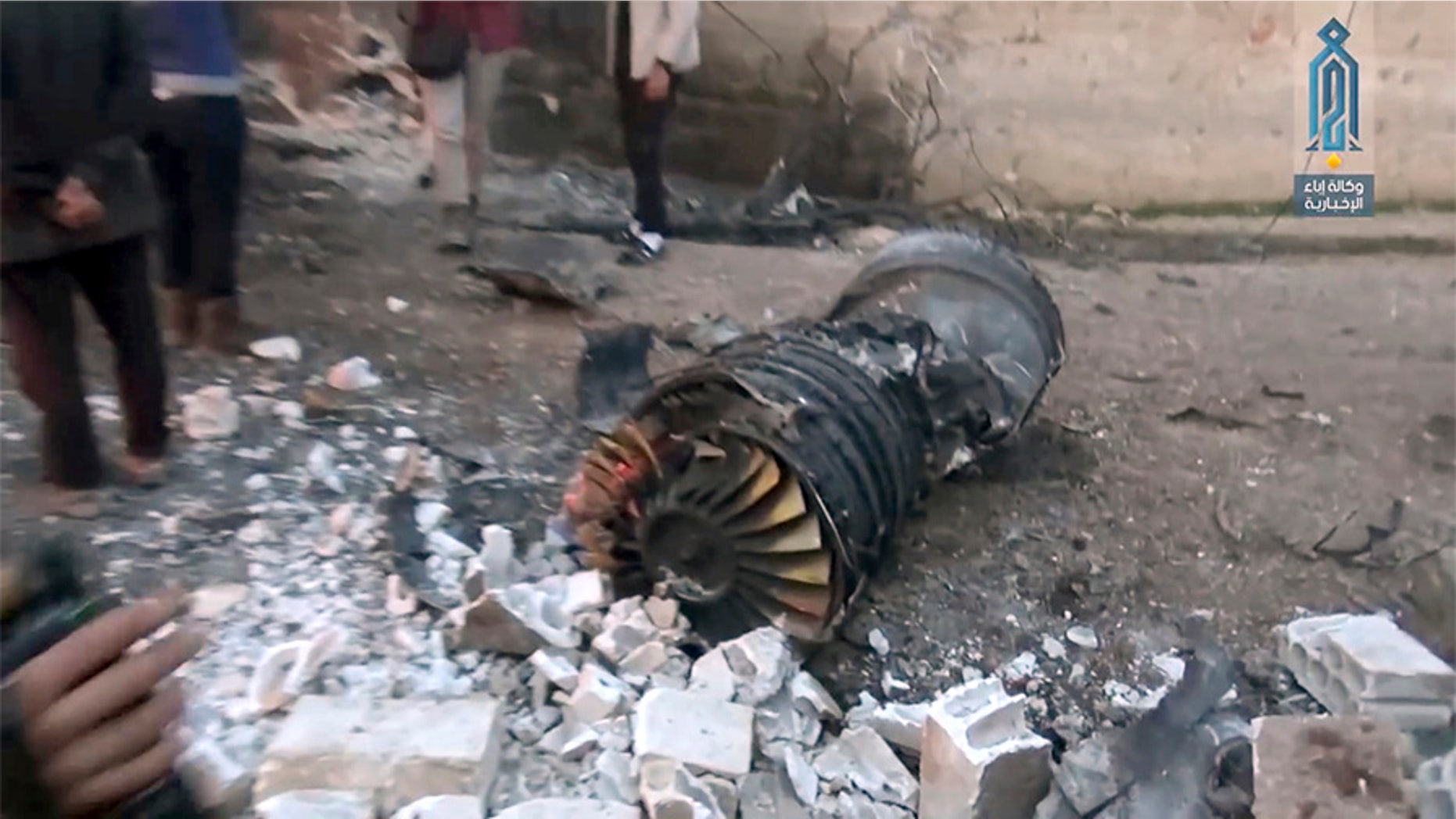 Photo provided by the Ibaa News Agency, the media arm of Al Qaeda branch in Syria, shows part of a Russian plane that was shot down by rebel fighters over northwest Idlib province in Syria, Saturday.