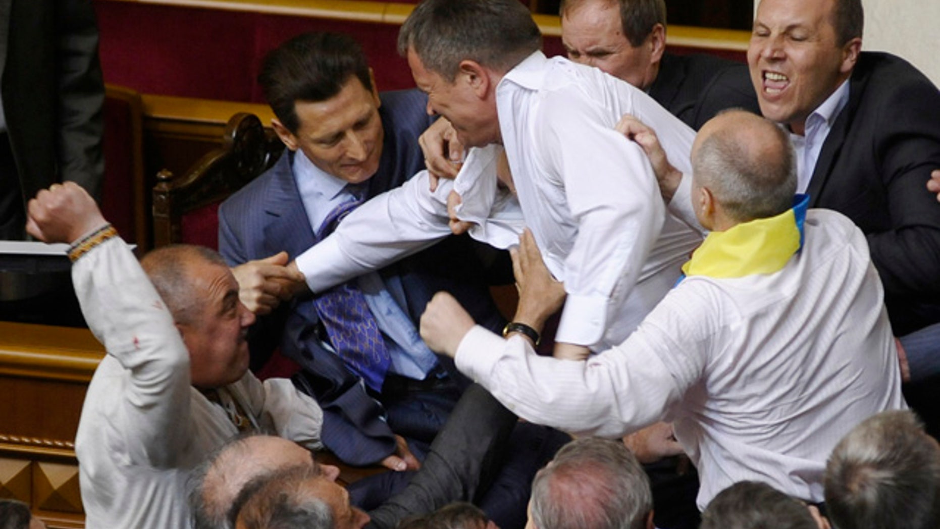 May 24, 2012: Lawmakers from pro-presidential and oppositional factions fight in the parliament session hall in Kiev, Ukraine.