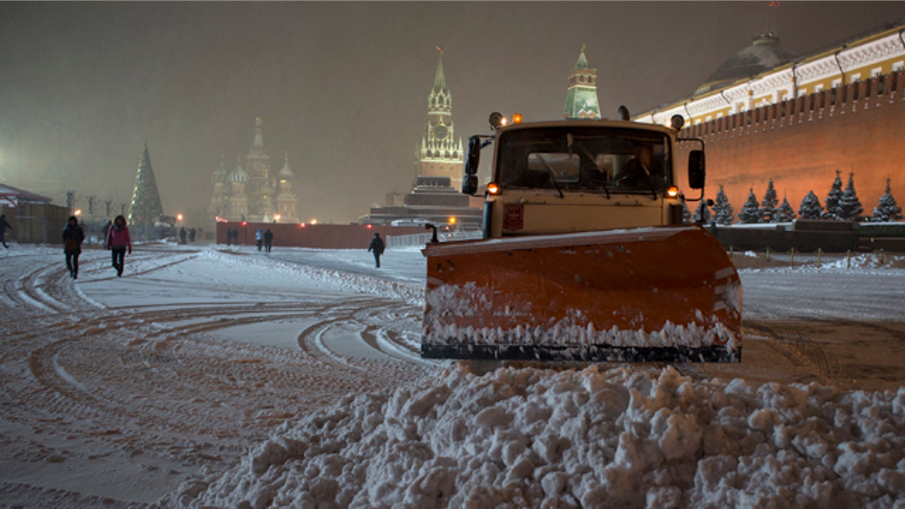 Nov. 29, 2012: A bulldozer removes snow in Red Square in Moscow, Russia.