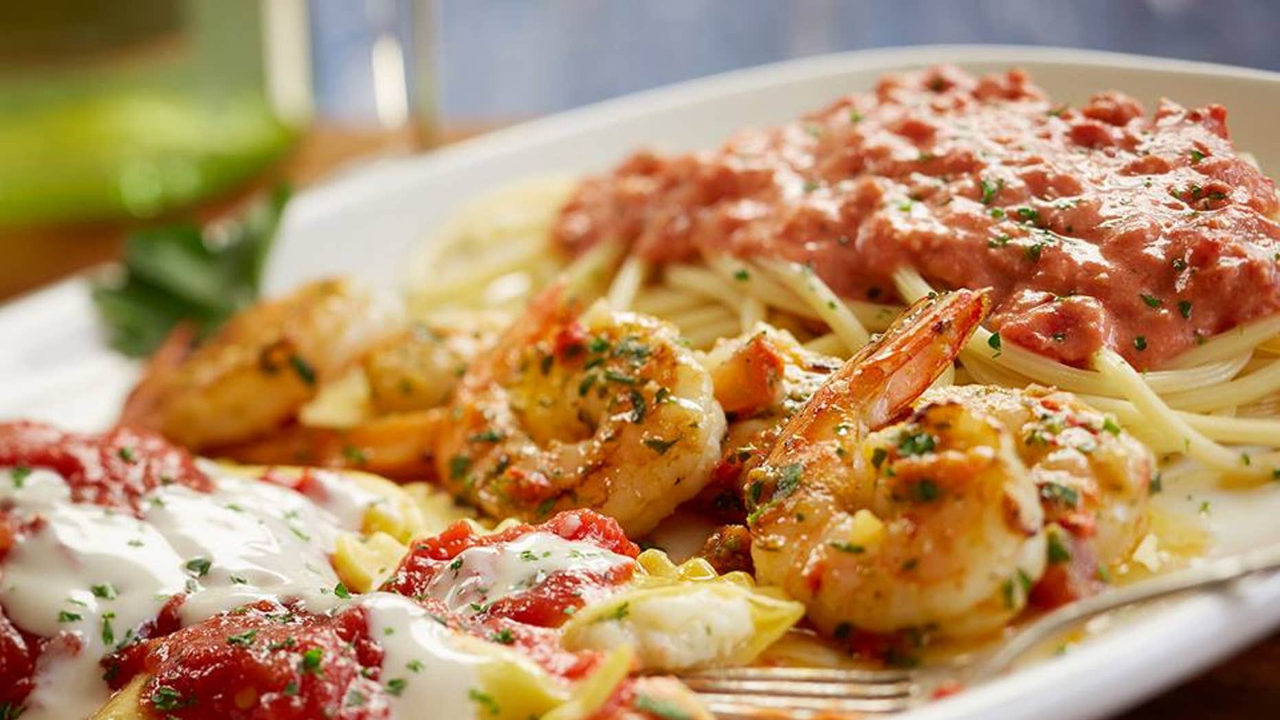 The Southern Tour of Italy features spicy pesto shrimp, cheese-filled mezzaluna and bucatini topped with spicy tomato bacon sauce.