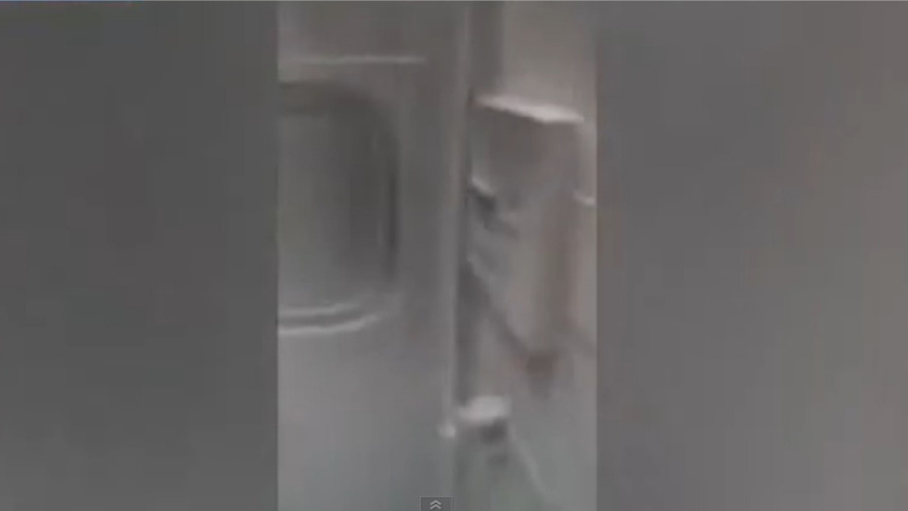 An Amtrak passenger captures a frozen, snow filled car on the way to Boston.
