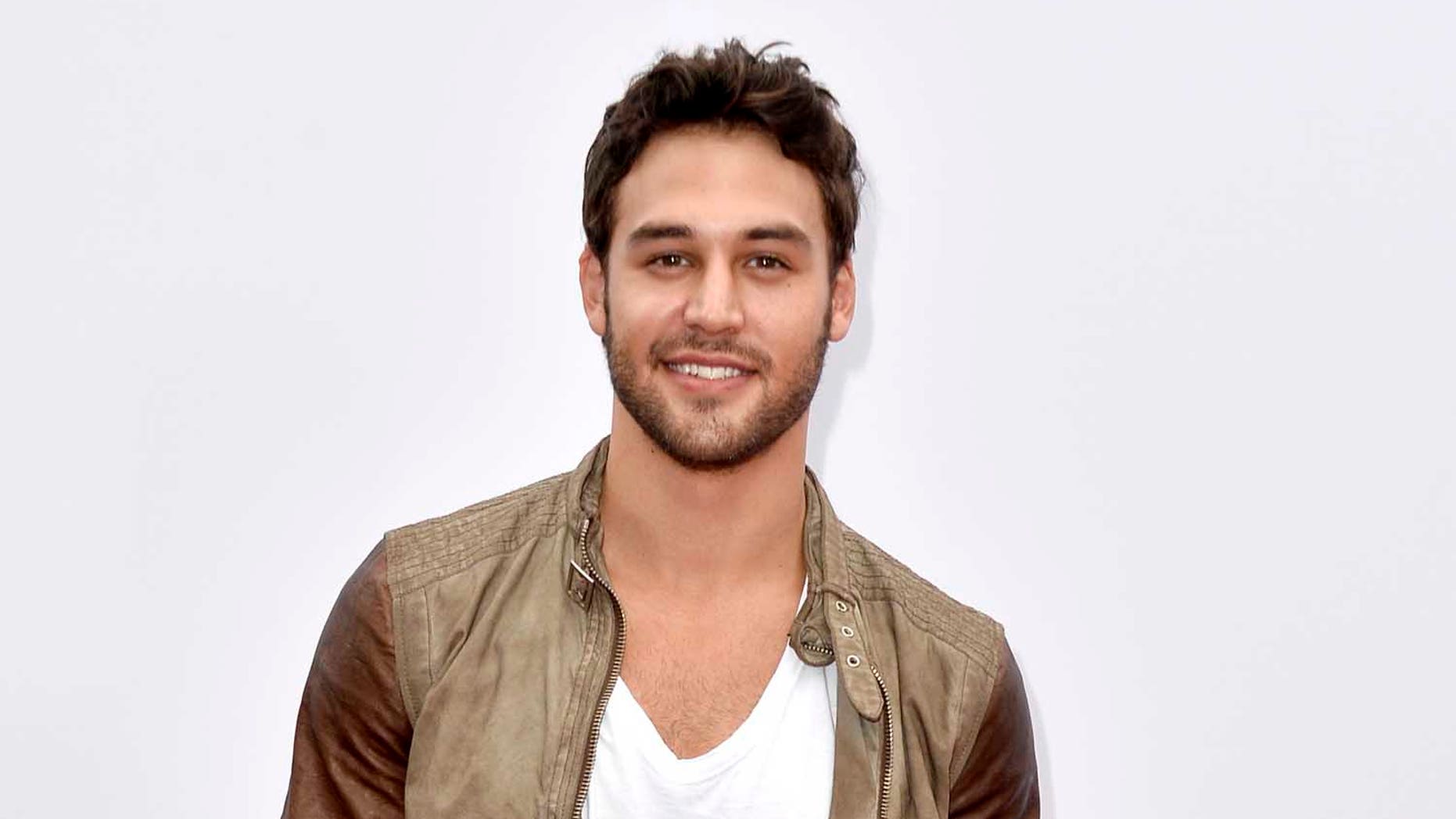 LOS ANGELES, CA - JULY 11: Actor Ryan Guzman attends the premiere of Summit Entertainment's "RED 2" at Westwood Village on July 11, 2013 in Los Angeles, California. (Photo by Frazer Harrison/Getty Images)