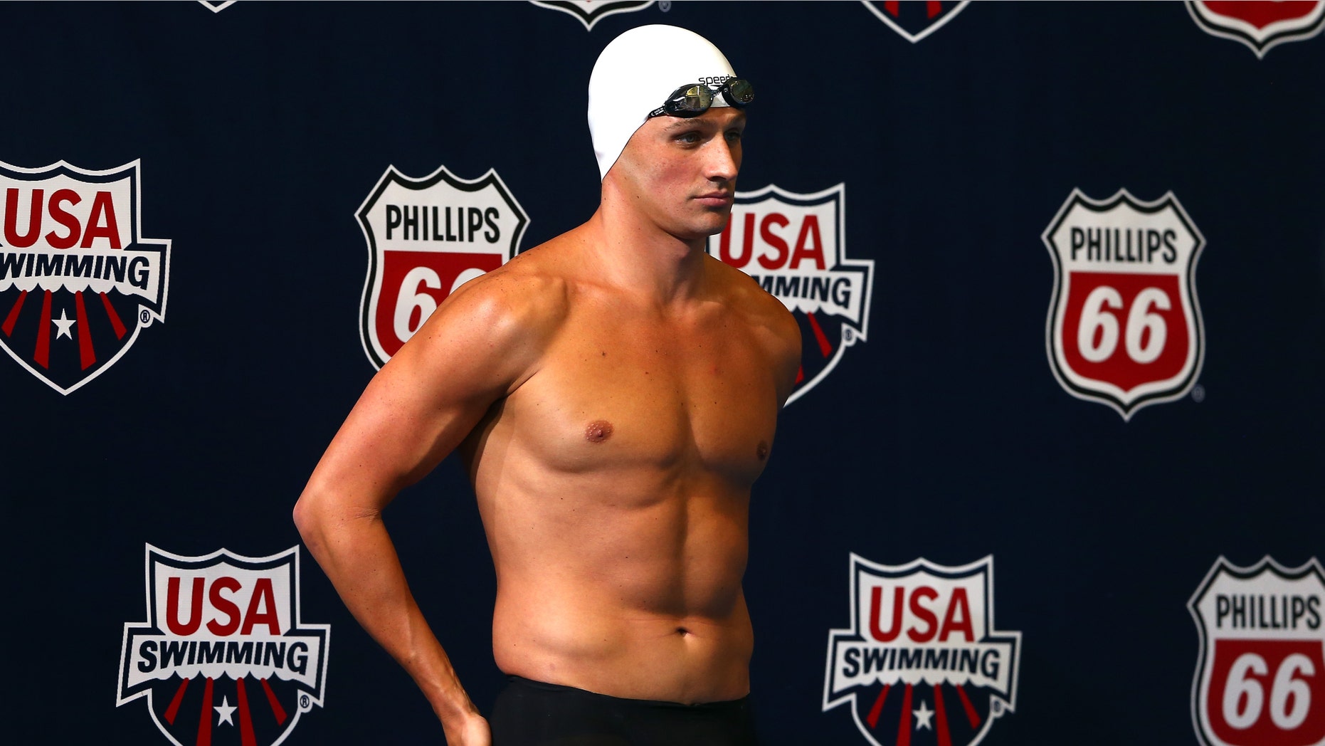 INDIANAPOLIS, IN - JUNE 25: Ryan Lochte prepares to swim in the preliminaries of the men's 100m freestyle during day 1 of the 2013 USA Swimming Phillips 66 National Championships and World Trials at the Indiana University Natatorium on June 25, 2013 in Indianapolis, Indiana. (Photo by Streeter Lecka/Getty Images)