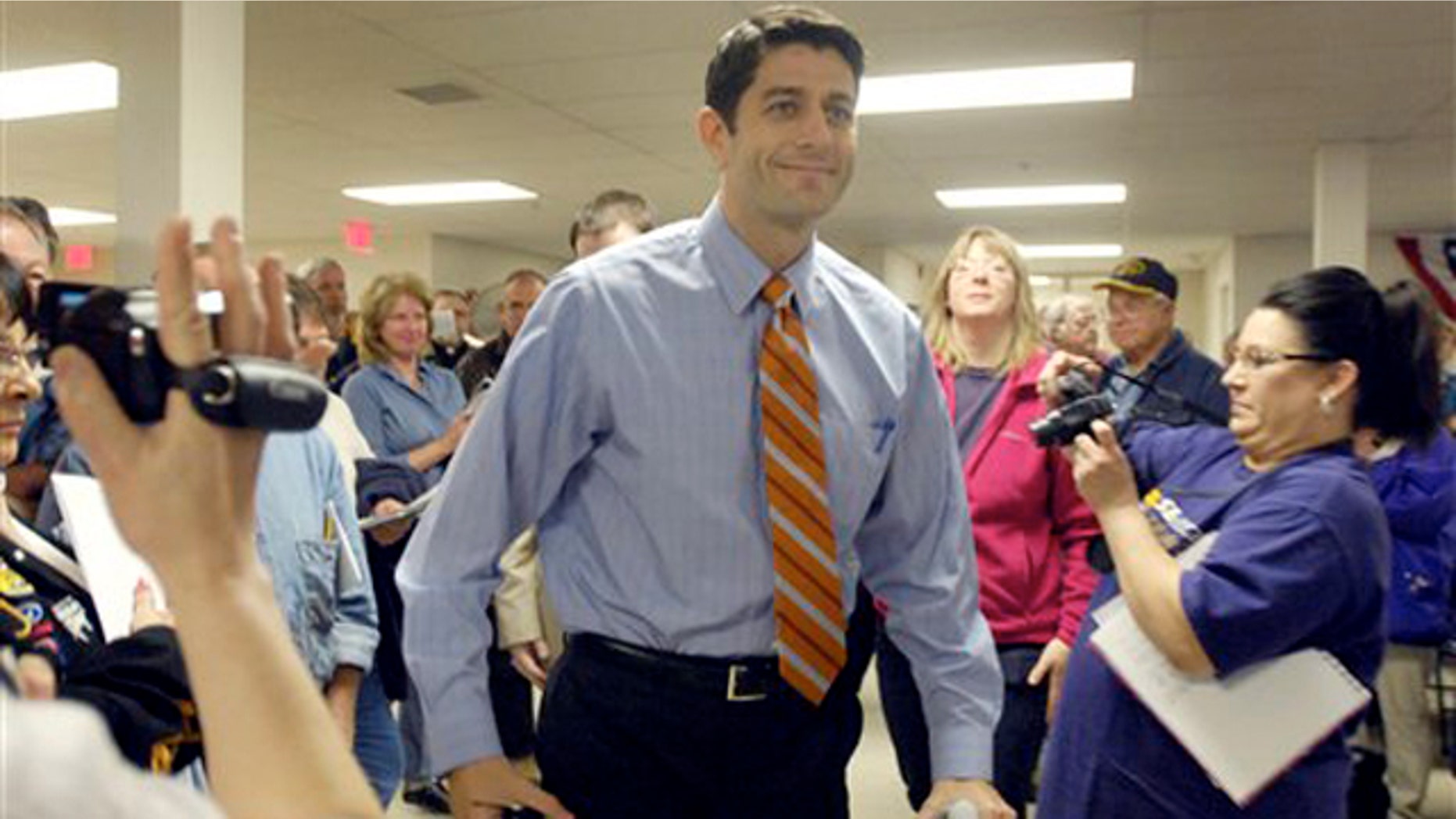 Rep. Paul Ryan arrives at a town hall meeting April 28 in Waterford, Wis.