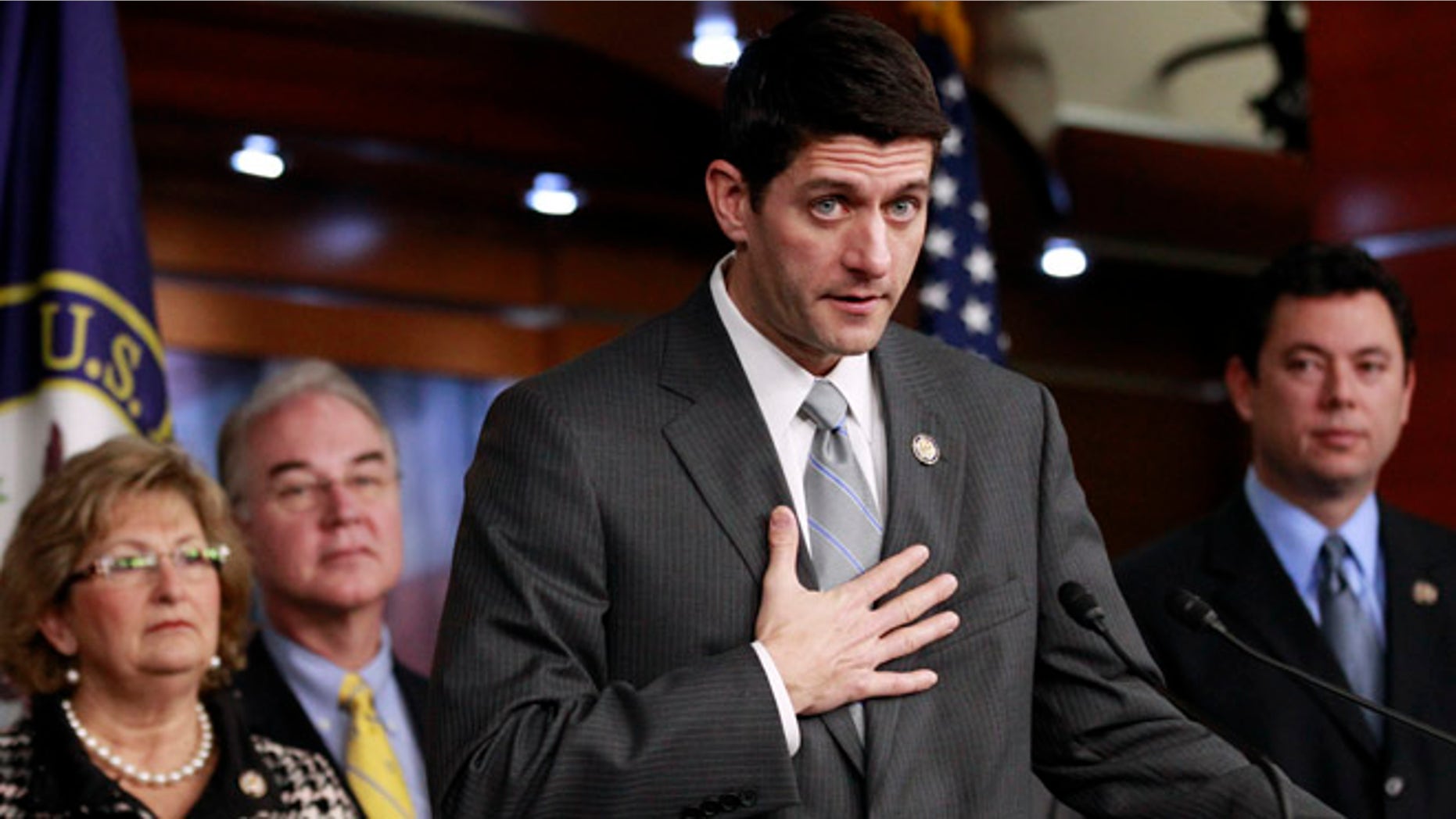 Dec. 7, 2011: House Budget Committee Chairman Rep. Paul Ryan, R-Wis., second from right, accompanied by fellow committee members, gestures during a news conference on Capitol Hill in Washington.