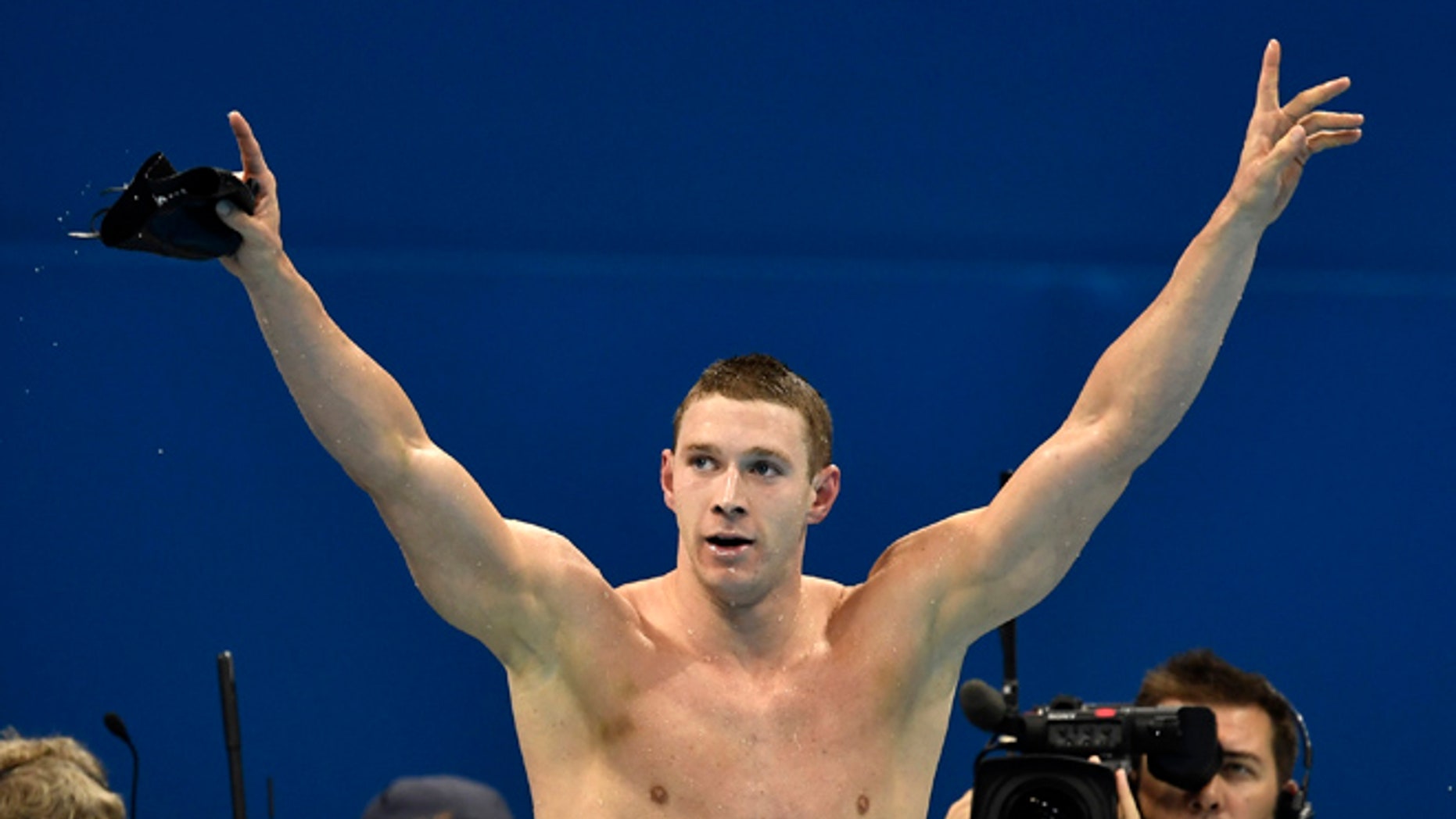 United States' Ryan Murphy celebrates after winning the gold medal in the men's 200-meter backstroke final during the swimming competitions at the 2016 Summer Olympics, Thursday, Aug. 11, 2016, in Rio de Janeiro, Brazil. (AP Photo/Martin Meissner)