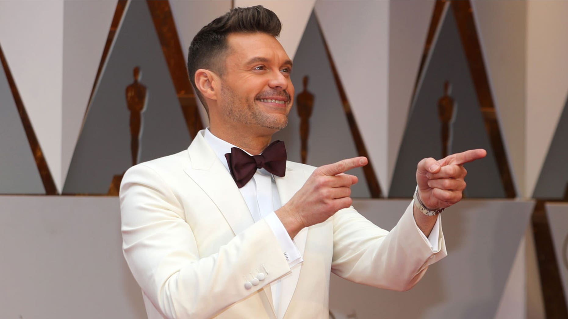Seacrest and Ryan will soon live within shouting distance of each other's extravagant homes.