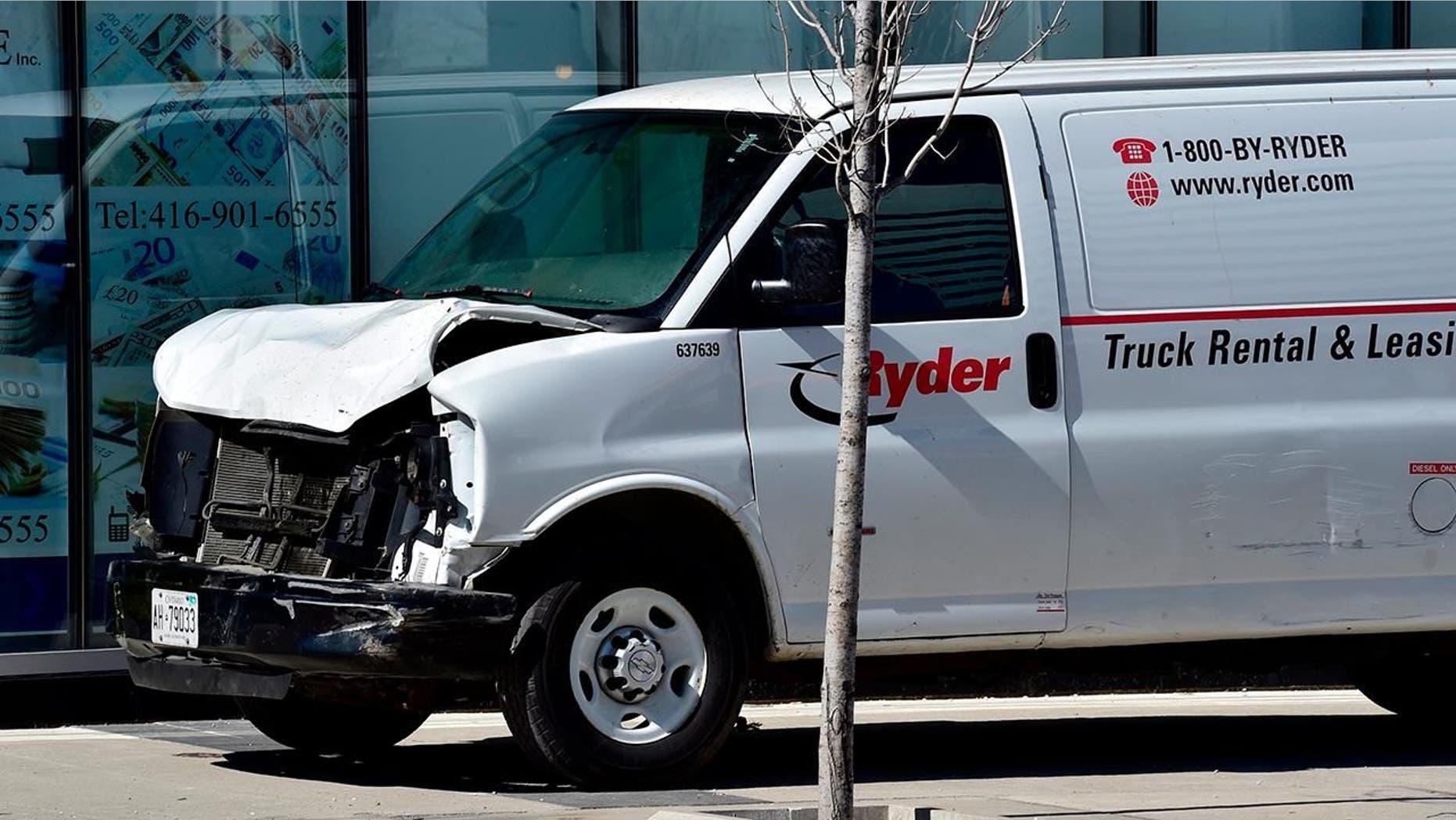 The white van plowed into pedestrians on a Toronto sidewalk Monday afternoon.