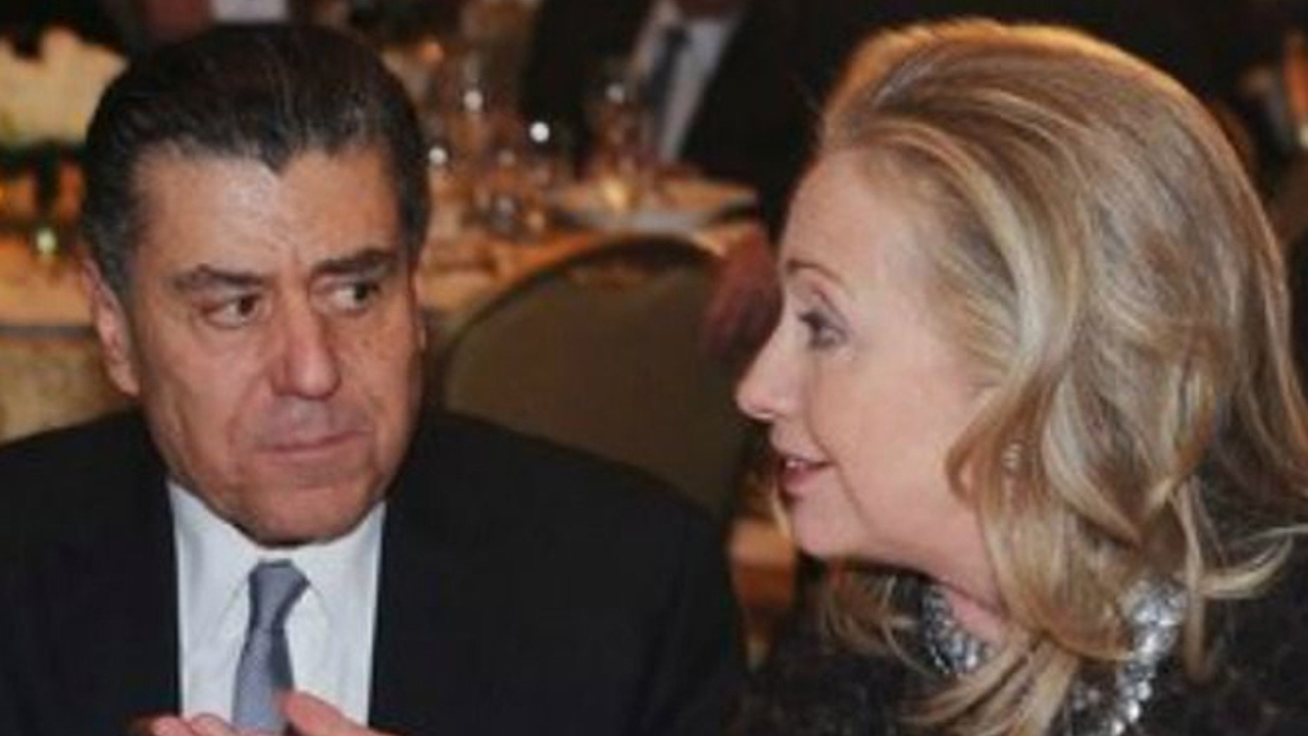 Haim Saban, (l.), has given $3.5 million to the presidential campaign of Hillary Clinton, (r.). (Reuters)