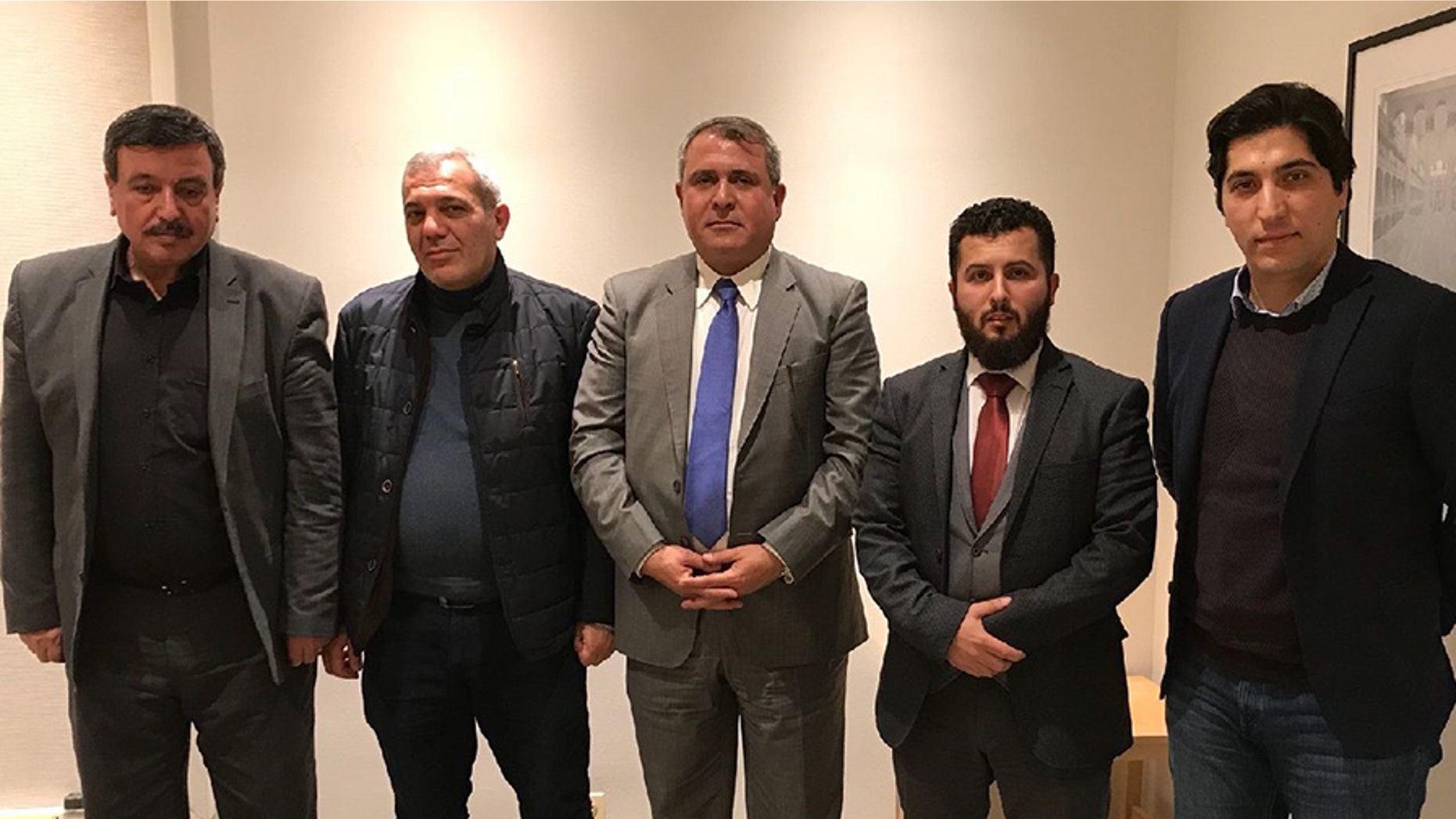 Members of a Free Syrian Army delegation — Saad Fahd Al Shweish, Khalid Aba, Yasir Al Haji, Mustafa Sejari and Osama Abu Zaid (from left to right) — are in Washington, D.C. to meet with the Trump administration about Russia and Iran. (Syrian American Council)