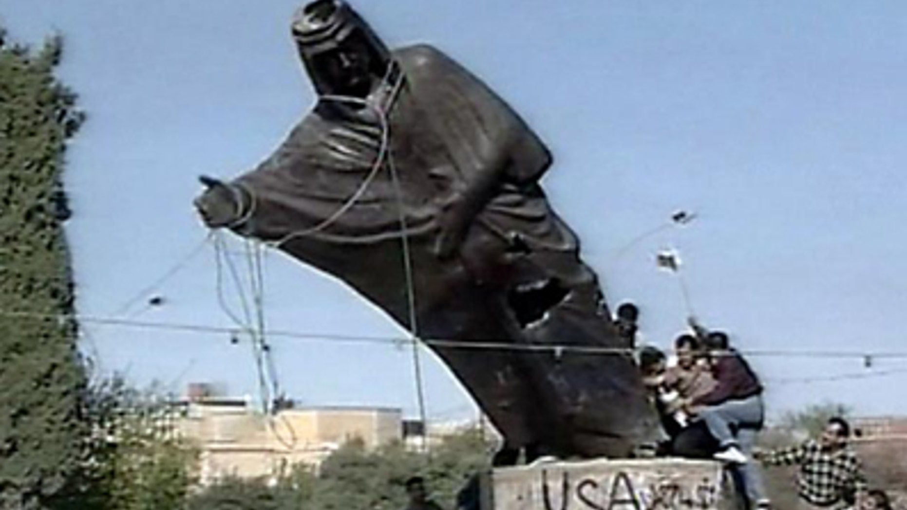 Kurds topple the statue of Saddam Hussein in Kirkuk, Northern Iraq in 2003.