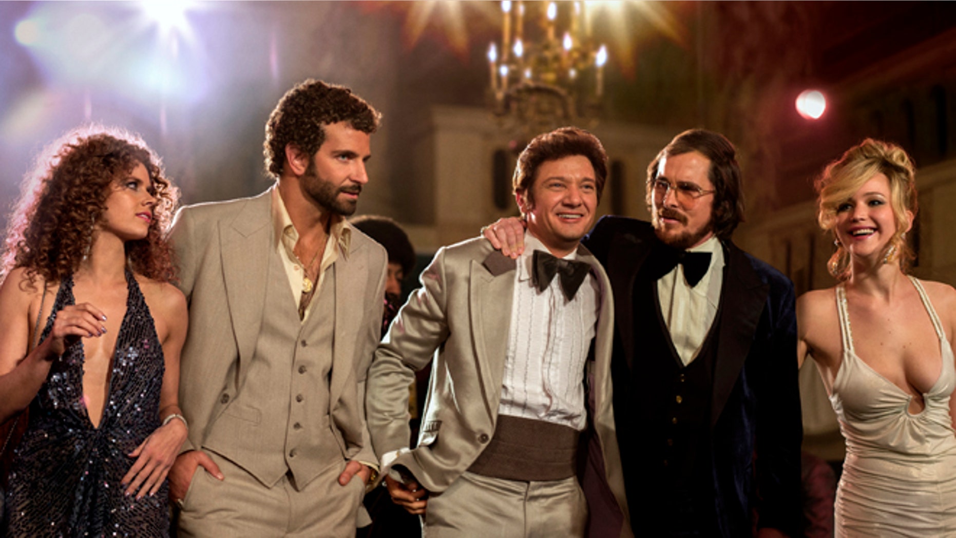 This film image released by Sony Pictures shows, from left, Amy Adams, Bradley Cooper, Jeremy Renner, Christian Bale and Jennifer Lawrence in a scene from "American Hustle." (AP Photo/Sony - Columbia Pictures, Francois Duhamel)
