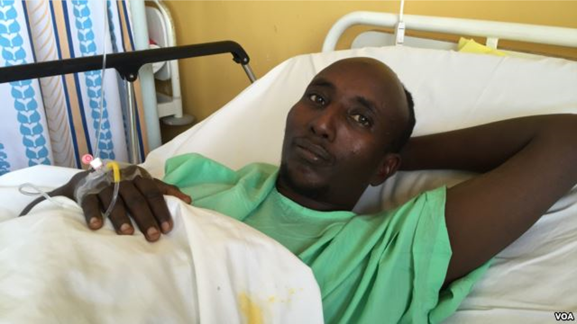 Salah Farah was shot when the bus he was traveling in was attacked by al-Shabaab militants in December 2015. (J. Craig/VOA)