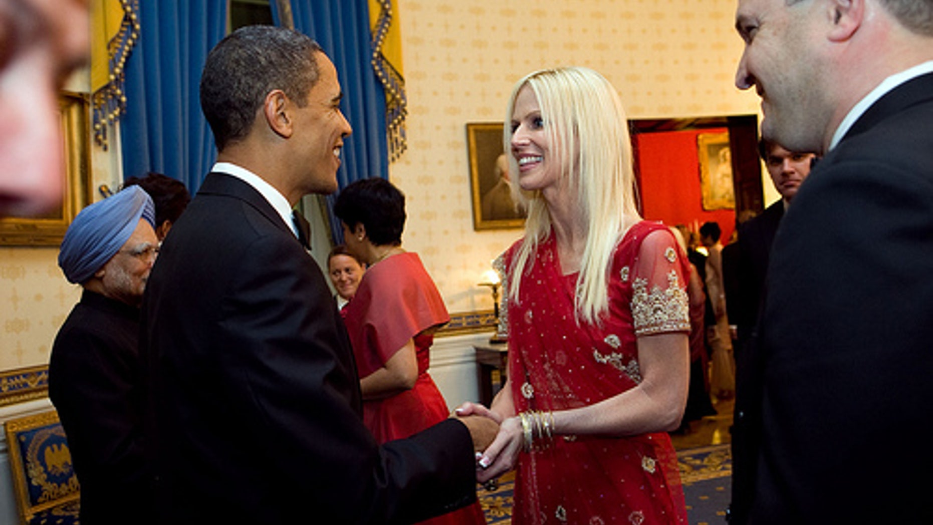 Nov. 24, 2009: President Barack Obama greets Michaele and Tareq Salahi during a receiving line in the Blue Room of the White House before the State Dinner with Prime Minister Manmohan Singh of India.
