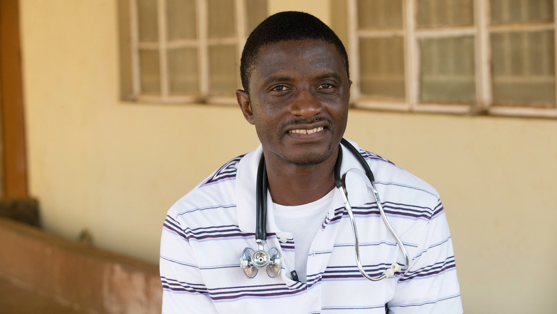 In this April 2014, file photo, provided by the United Methodist News Service, Dr. Martin Salia poses for a photo at the United Methodist Church's Kissy Hospital outside Freetown, Sierra Leone.