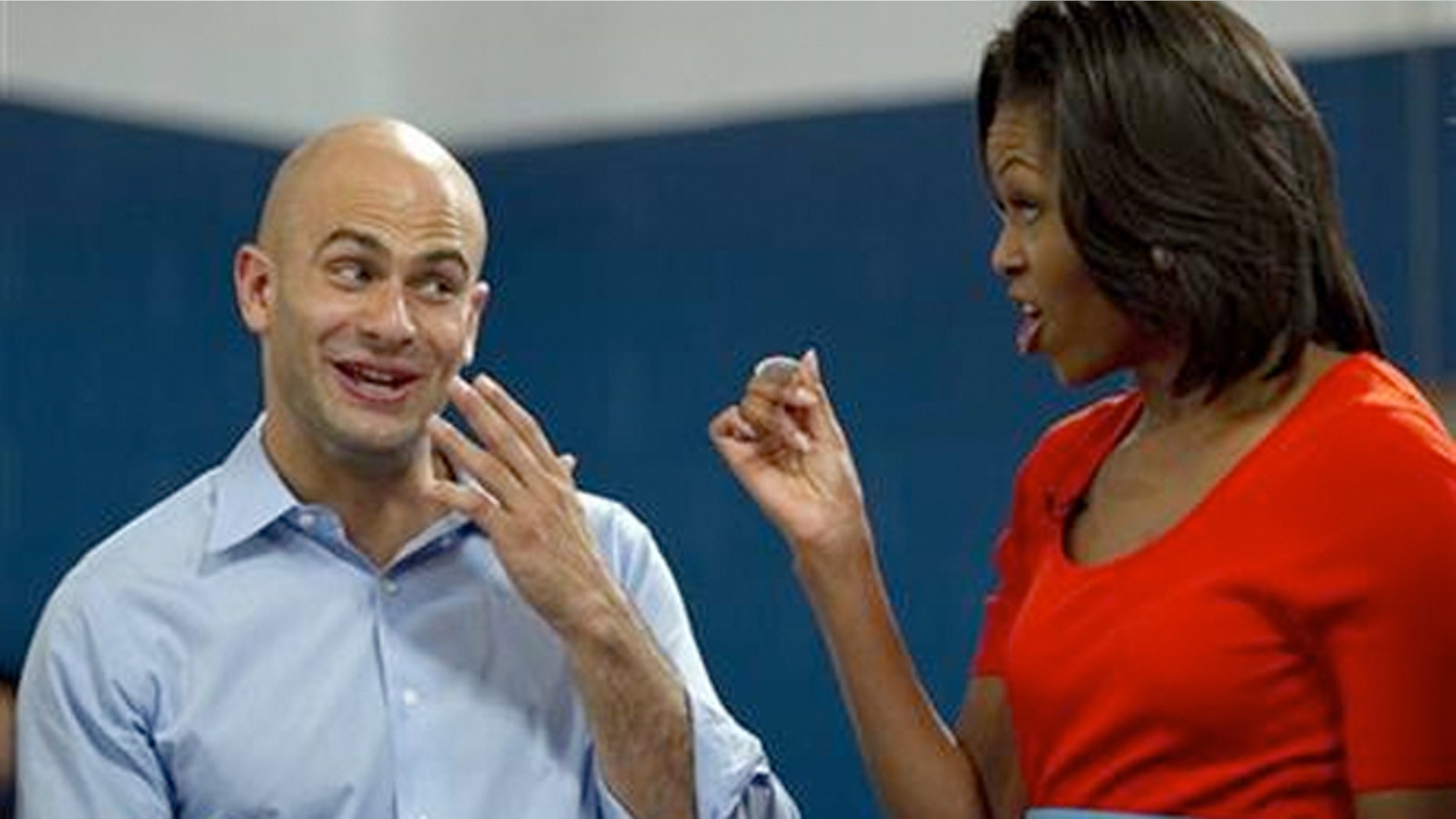 FILE: House assistant chef Sam Kass, who cooks dinner for President Barack Obama several nights a week, with First Lady Michelle Obama.