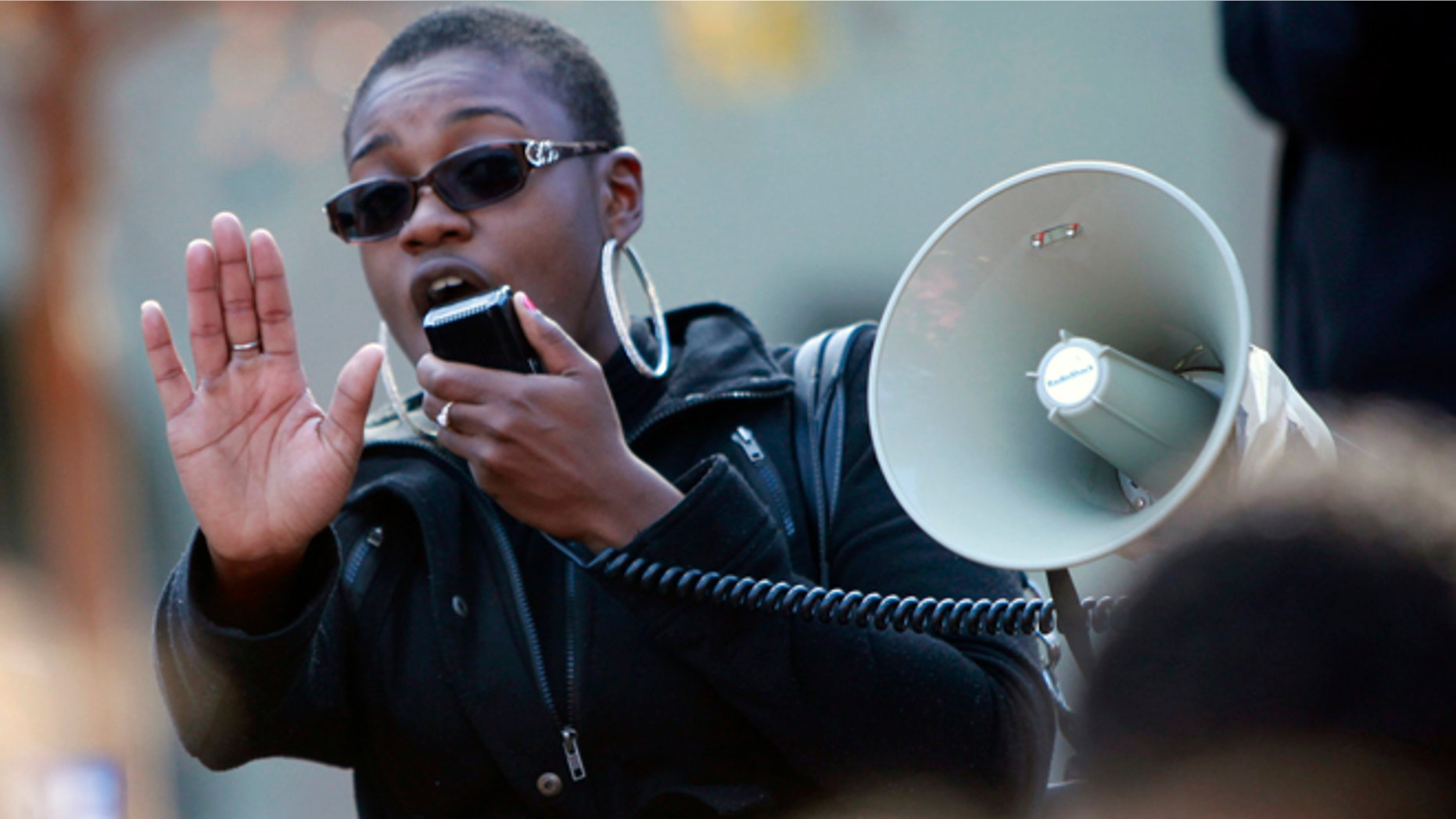 Nov. 21, 2013: Champagne Ellison, a senior at San Jose State University, speaks at a rally protesting a reported racial hazing of an African-American freshman last month in San Jose, Calif.