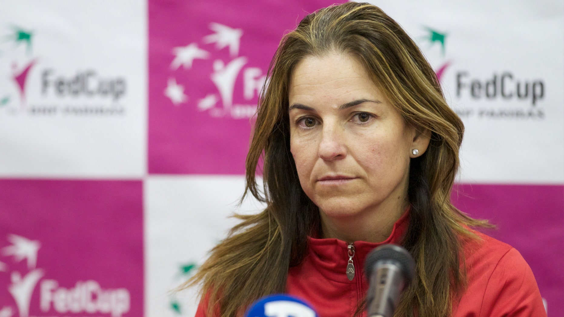 Spanish team captain Arantxa Sanchez Vicario listens to a question during the team's news conference in Moscow, Russia, Wednesday, Feb. 1, 2012.