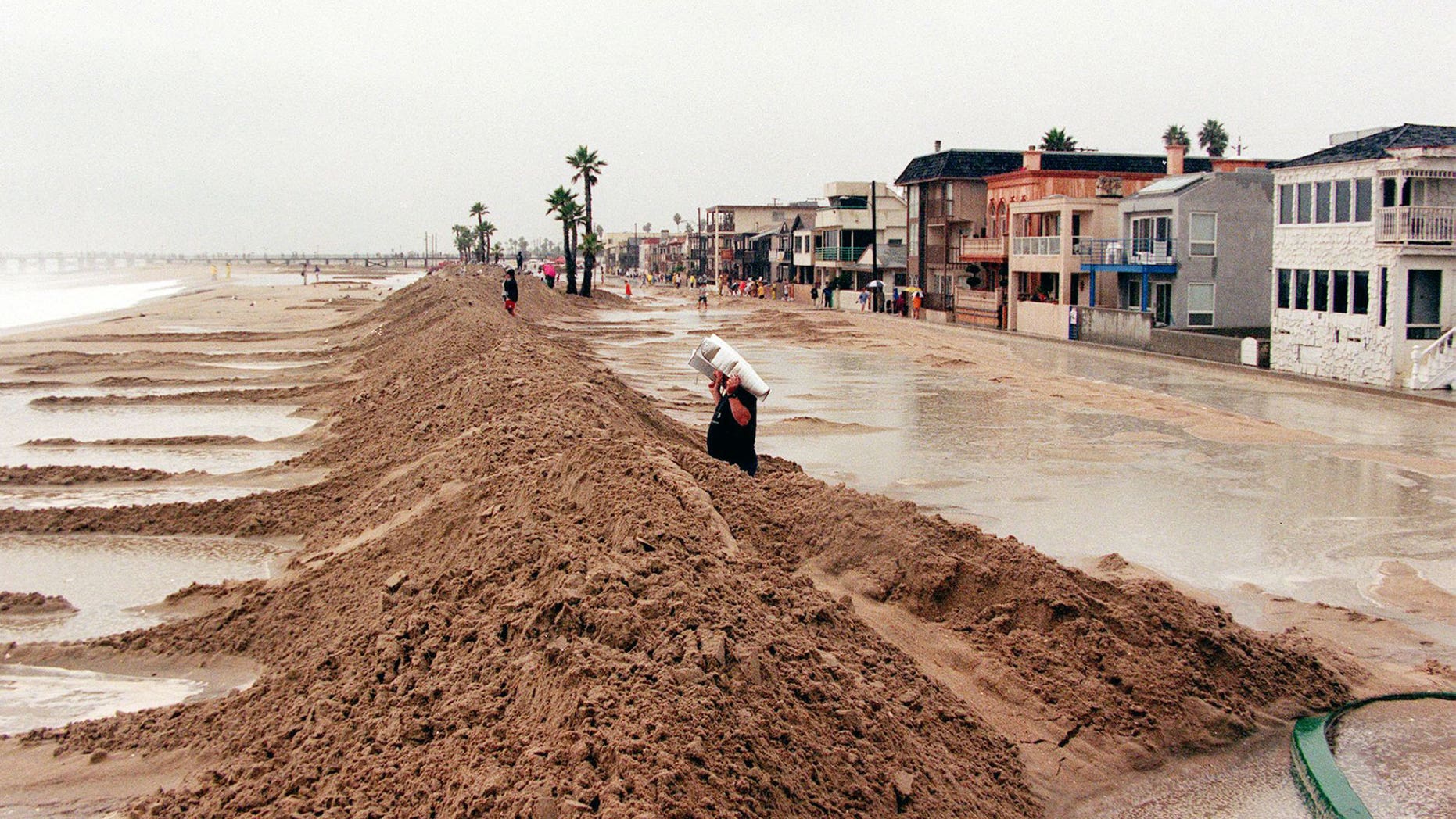 A sand dike protects the Orange County beach