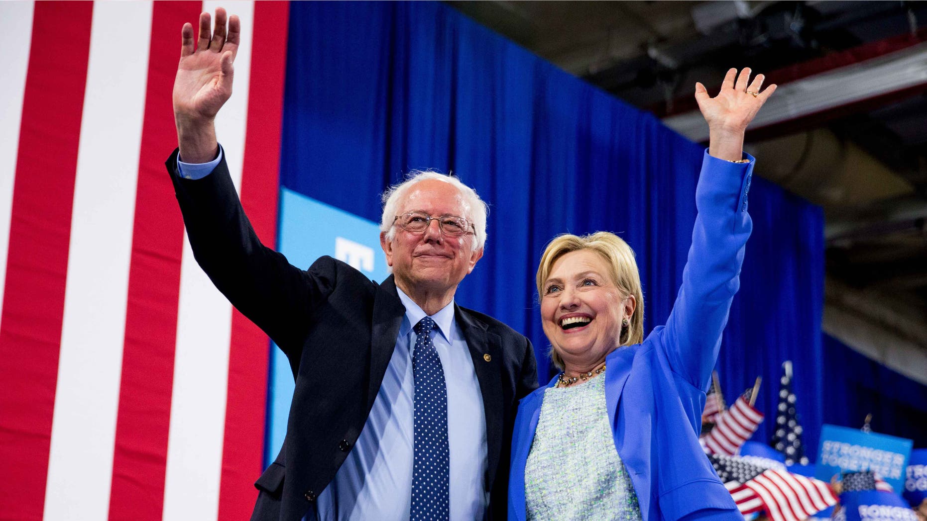 Hillary Clinton and Sen. Bernie Sanders during a rally in Portsmouth, N.H., Tuesday, July 12, 2016.