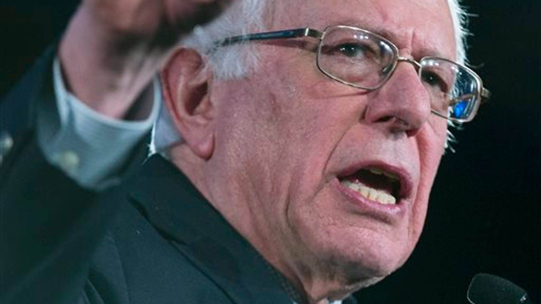 Democratic presidential candidate Sen. Bernie Sanders, I-Vt., speaks during the Jefferson Jackson Dinner, on Saturday, Feb. 13, 2016, in Denver. (AP Photo/Evan Vucci)