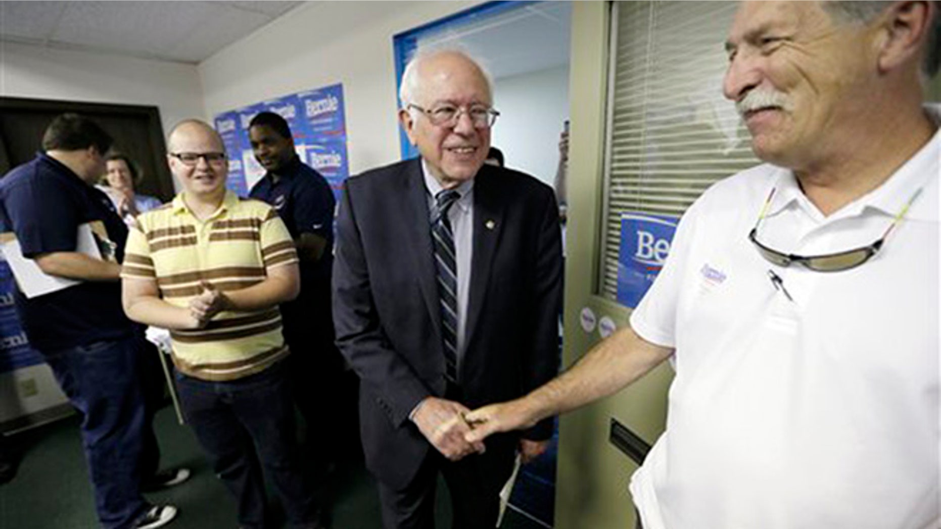 Democratic presidential candidate Sen. Bernie Sanders greets supporters at an open house at his Iowa campaign headquarters, Saturday, June 13, 2015, in Des Moines, Iowa. (AP Photo/Charlie Neibergall)