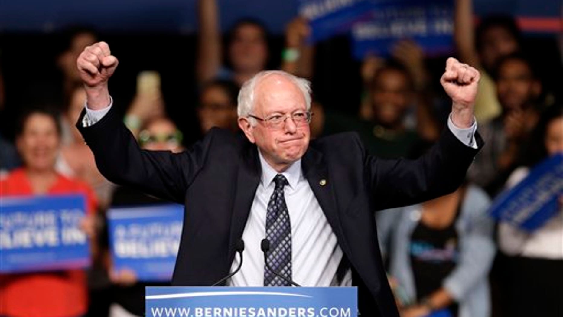 Democratic presidential candidate, Sen. Bernie Sanders, I-Vt. acknowledges his supporters on arrival at a campaign rally, Tuesday, March 8, 2016, in Miami. (AP Photo/Alan Diaz)