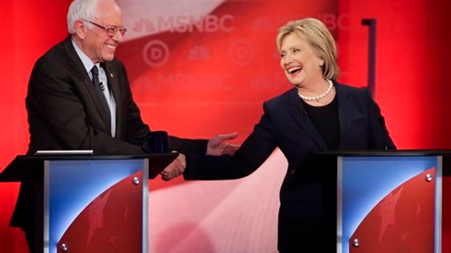Democratic presidential candidate, Sen. Bernie Sanders, I-Vt, and Democratic presidential candidate, Hillary Clinton shake hands during a Democratic presidential primary debate hosted by MSNBC at the University of New Hampshire Thursday, Feb. 4, 2016, in Durham, N.H. (AP Photo/David Goldman)