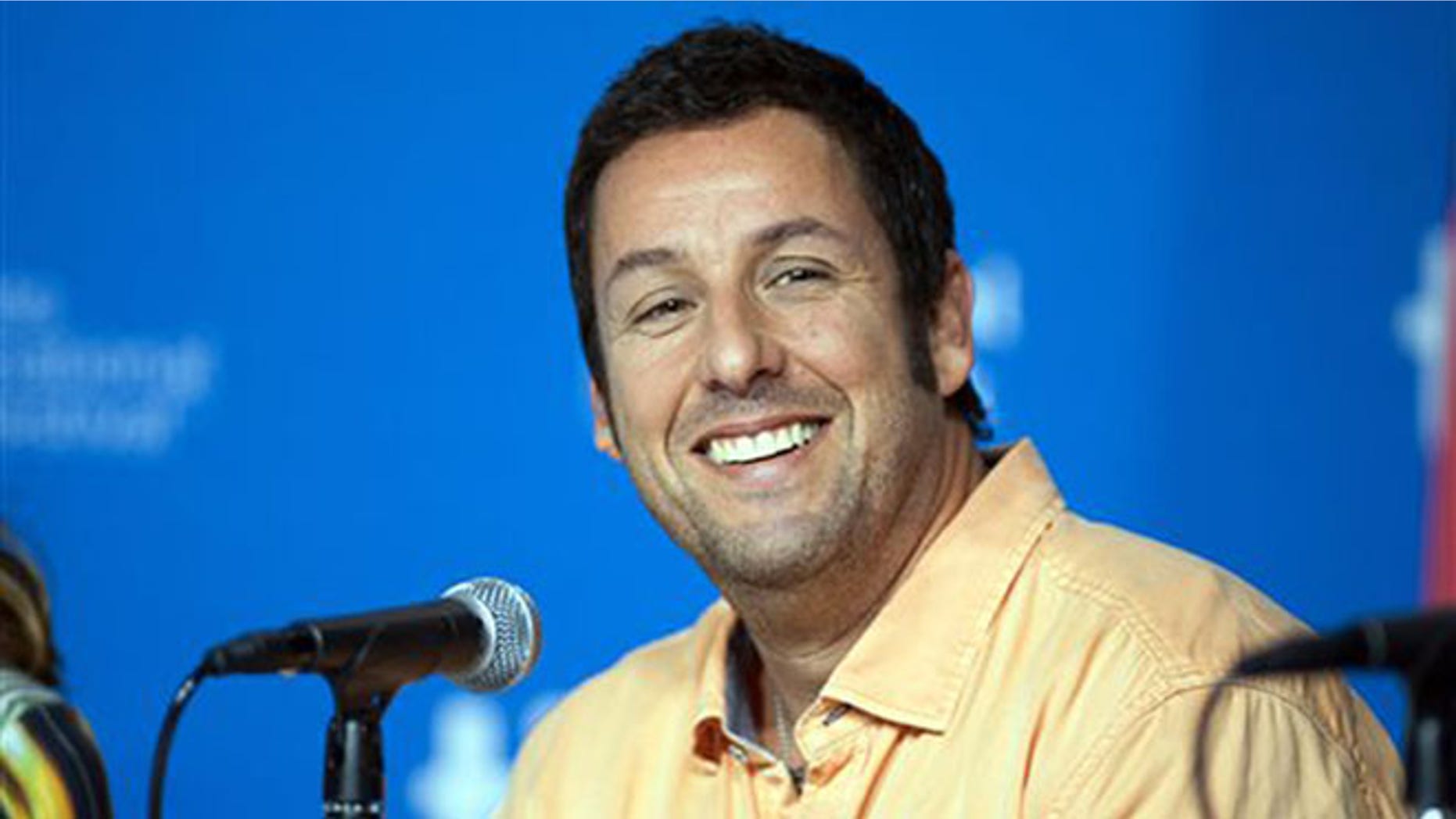 In this Sept. 6, 2014 file photo, actor Adam Sander smiles during a news conference for 'Men, Women, and Children' at the 2014 Toronto International Film Festival. (Hannah Yoon/The Canadian Press via AP, File) MANDATORY CREDIT