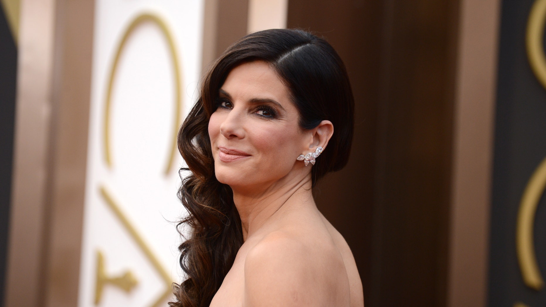 March 2, 2014. Sandra Bullock arrives at the Oscars at the Dolby Theatre, in Los Angeles.