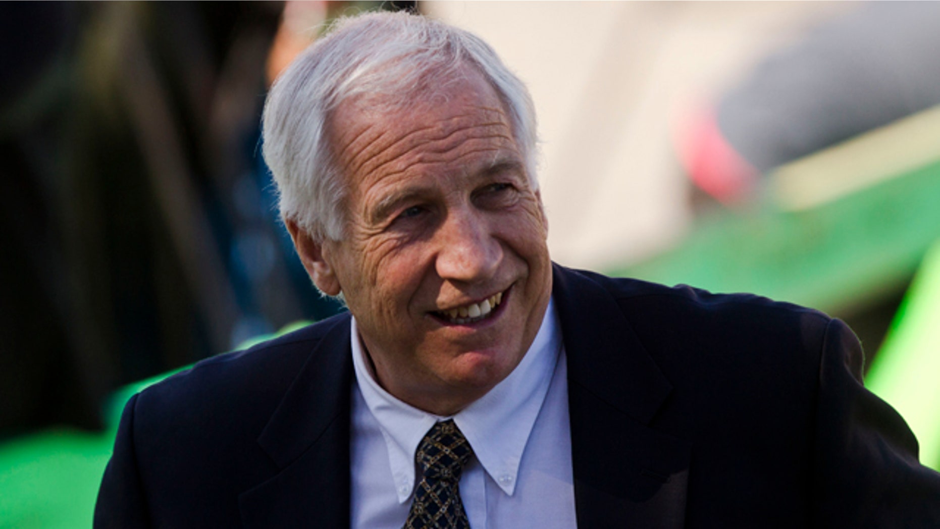 April 5: Jerry Sandusky, center, a former Penn State assistant football coach charged with sexually abusing boys, leaves the Centre County Courthouse in Bellefonte, Pa., after a pretrial hearing at which his attorney requested to have the charges dismissed.
