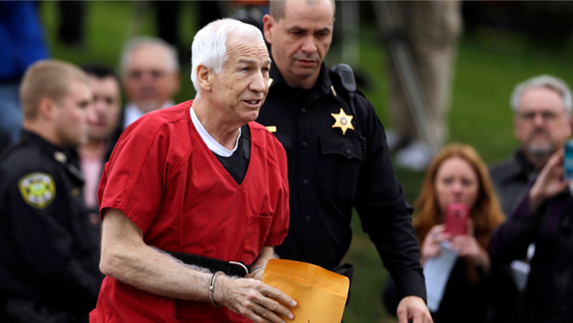 Oct. 9: Former Penn State University assistant football coach Jerry Sandusky arrives at the Centre County Courthouse for a sentencing hearing.