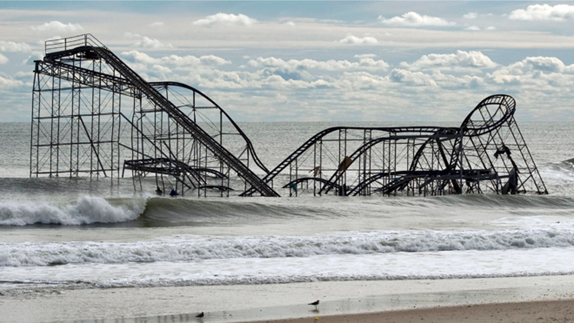 Nov. 1, 2012: The remnants of a roller coaster sits in the surf three days after Hurricane Sandy came ashore in Seaside Heights, New Jersey.