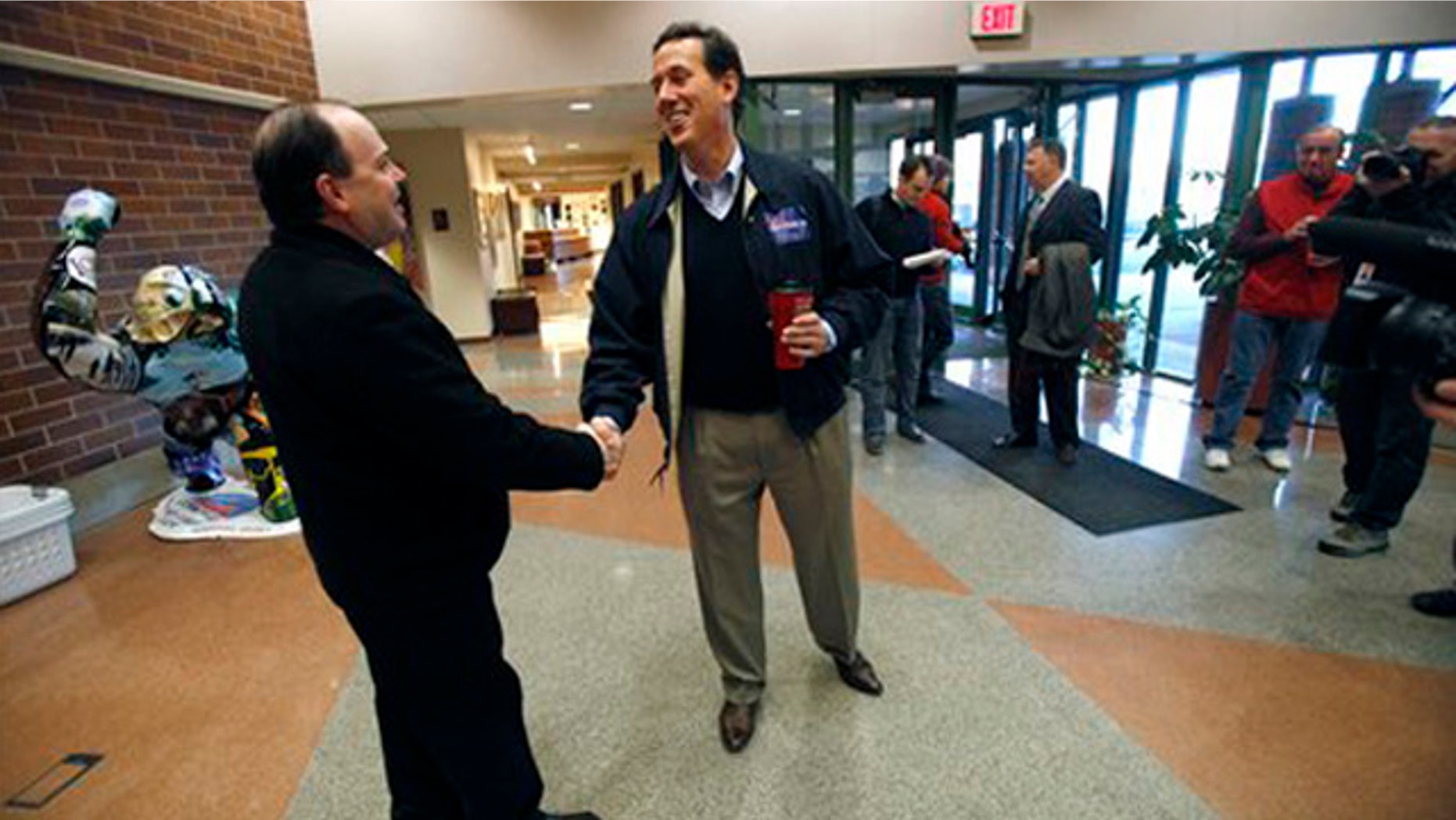 Dec. 29, 2011: Rick Santorum arrives at a campaign stop in Coralville, Iowa.