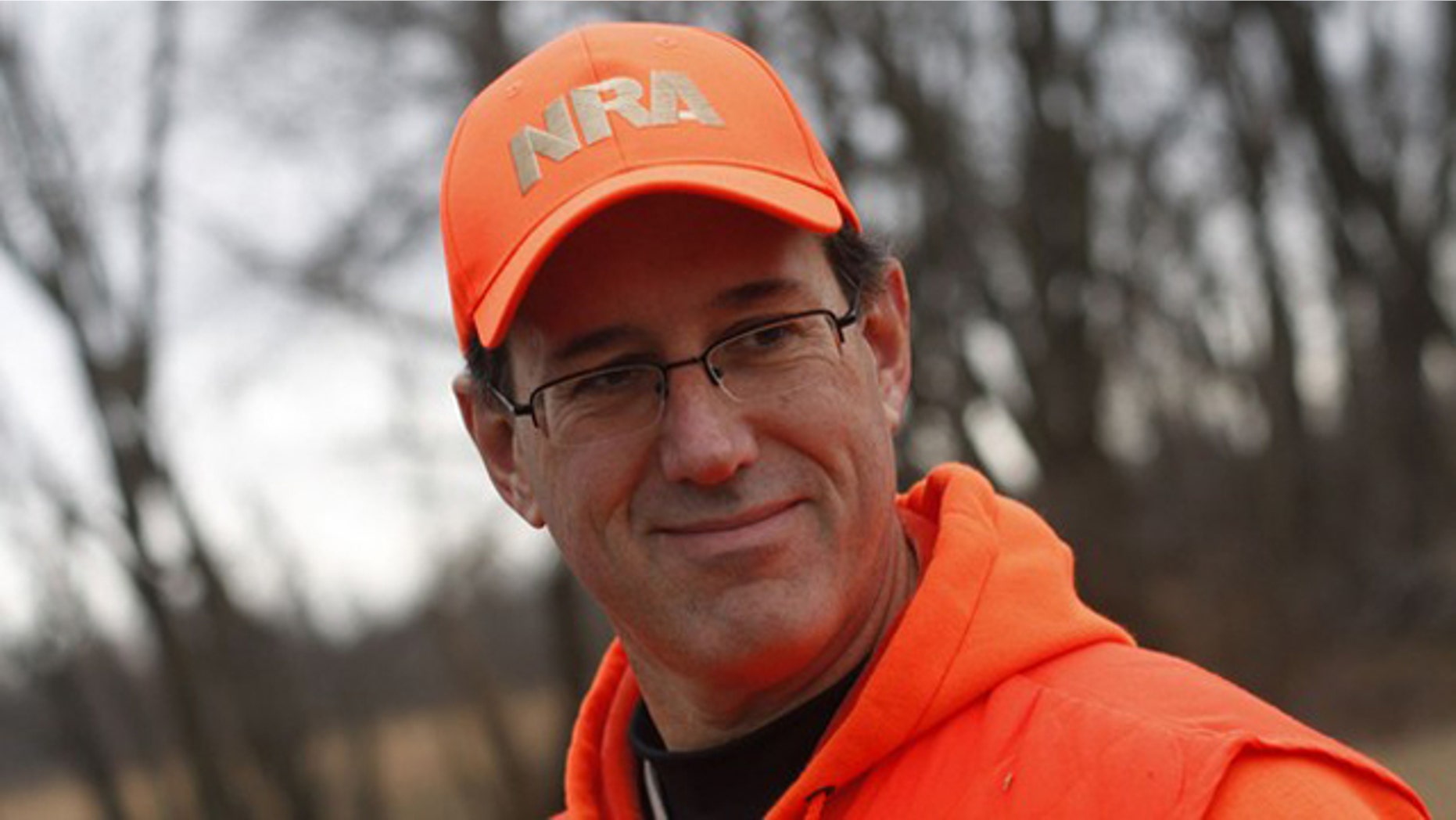 Dec. 26, 2011: Republican presidential candidate and former Pennsylvania Sen. Rick Santorum takes a break from pheasant hunting in Adel, Iowa.