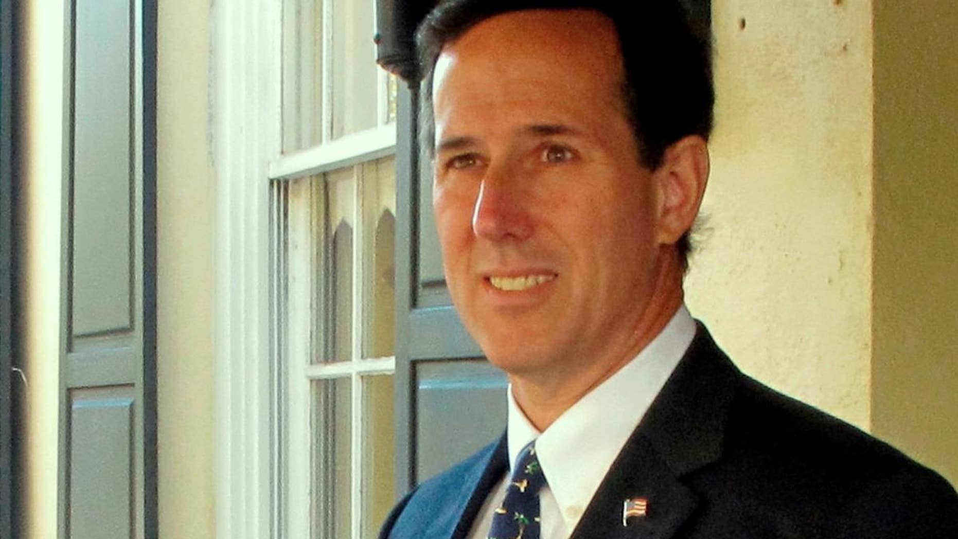 Former Pa. Sen. Rick Santorum leaves a speaking engagement in Charleston, S.C., on Monday, Dec. 6, 2010. The Republican was wrapping up a two-day visit to Charleston as part of his seventh trip to the state before South Carolina's first-in-the-South GOP primary in 2012. (AP Photo/Bruce Smith)