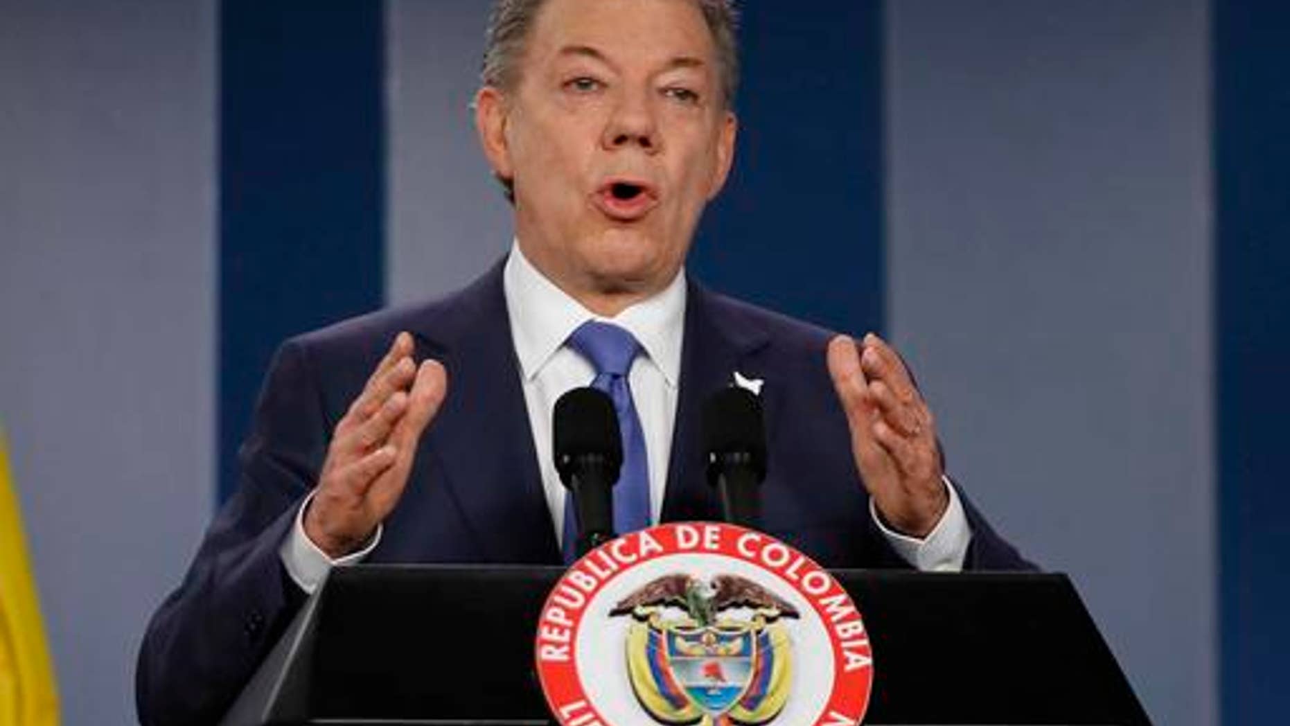 FILE - In this Wednesday, Oct. 4, 2016 file photo Colombiaâs President Juan Manuel Santos delivers a statement to the press after meeting with former President Alvaro Uribe and other opposition leaders at the presidential palace in Bogota, Colombia. Colombian President Juan Manuel Santos has won Nobel Peace Prize it was announced on Friday Oct. 7, 2016. (AP Photo/Fernando Vergara, File)