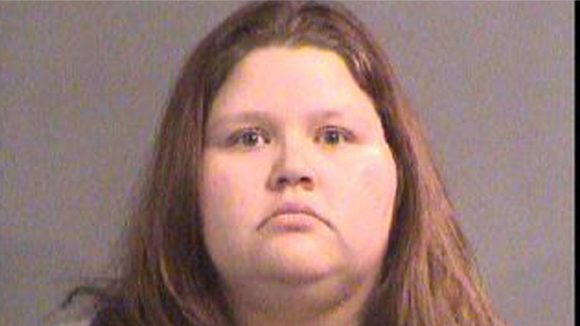 Sarah Hopkins' booking photo. (Segdwick County Jail)
