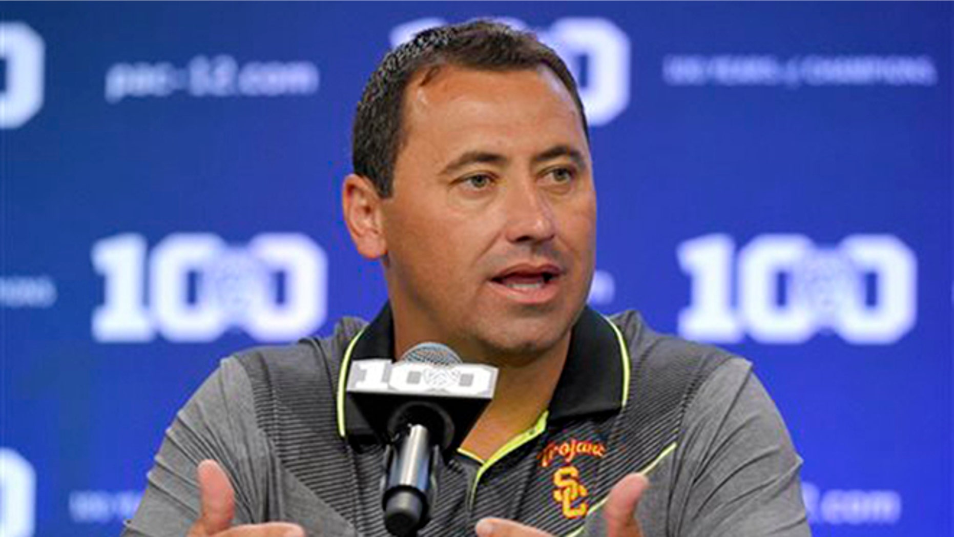 FILE - In this July 31, 2015, file photo, Southern California coach Steve Sarkisian speaks to reporters during NCAA college Pac-12 Football media days in Burbank, Calif. (AP Photo/Mark J. Terrill, File)